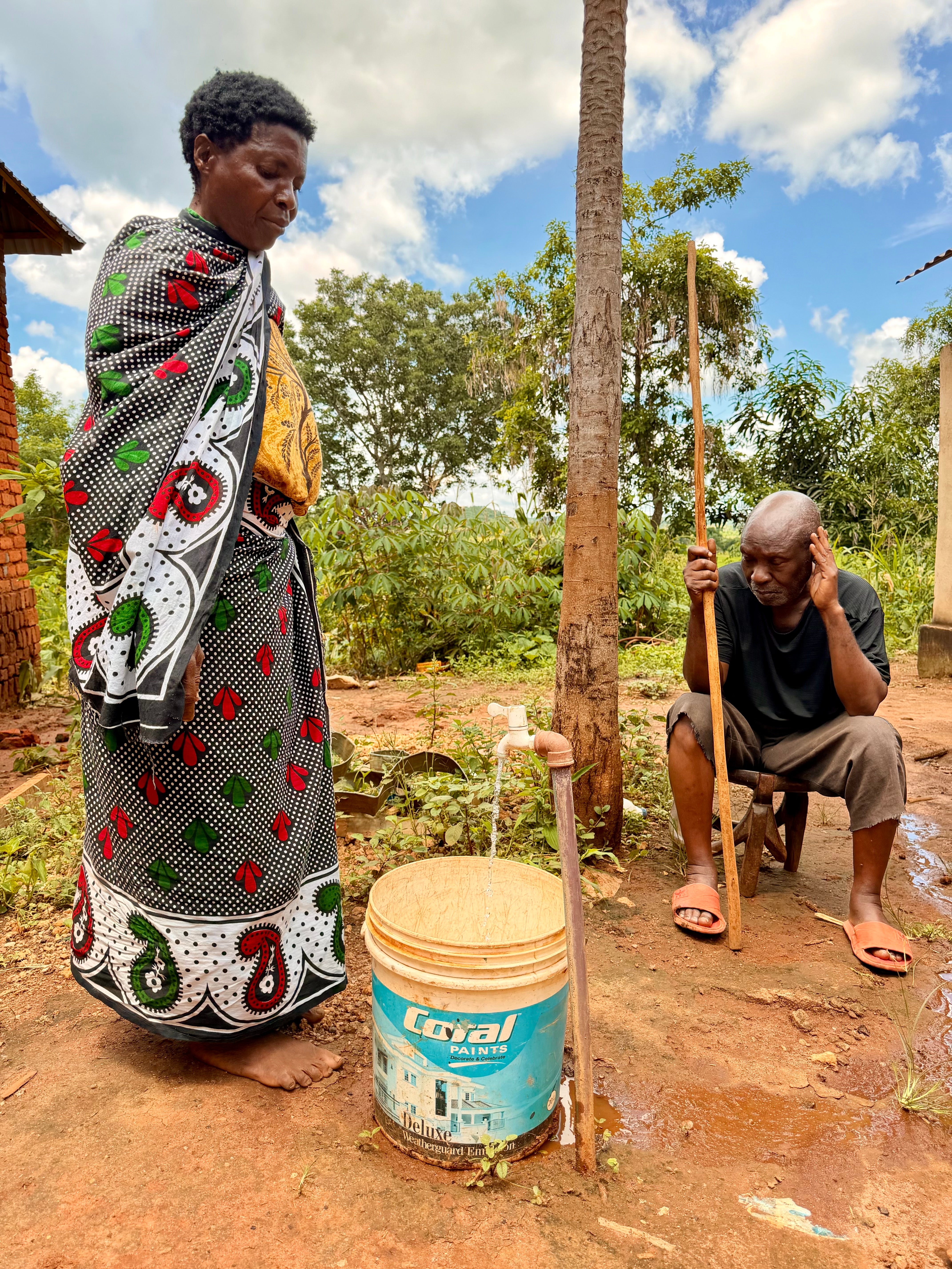 Mama Sabanga, pictured with her husband, describe the transformative impact of a new, deep borehole. In other parts of the region, however, shallower boreholes are drying out
