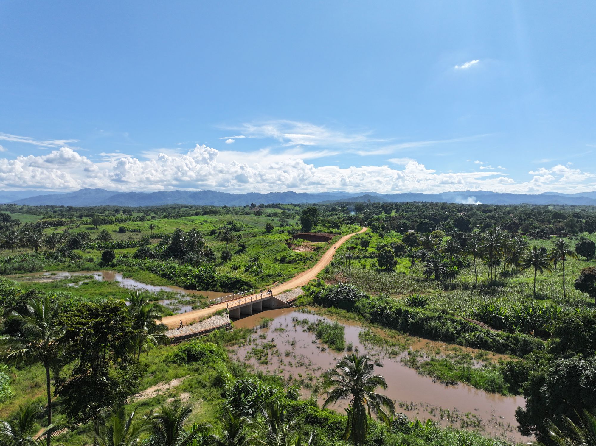 The escalating climate crisis is undermining World Vision’s work, such as this new bridge that is already under threat from flooded rivers
