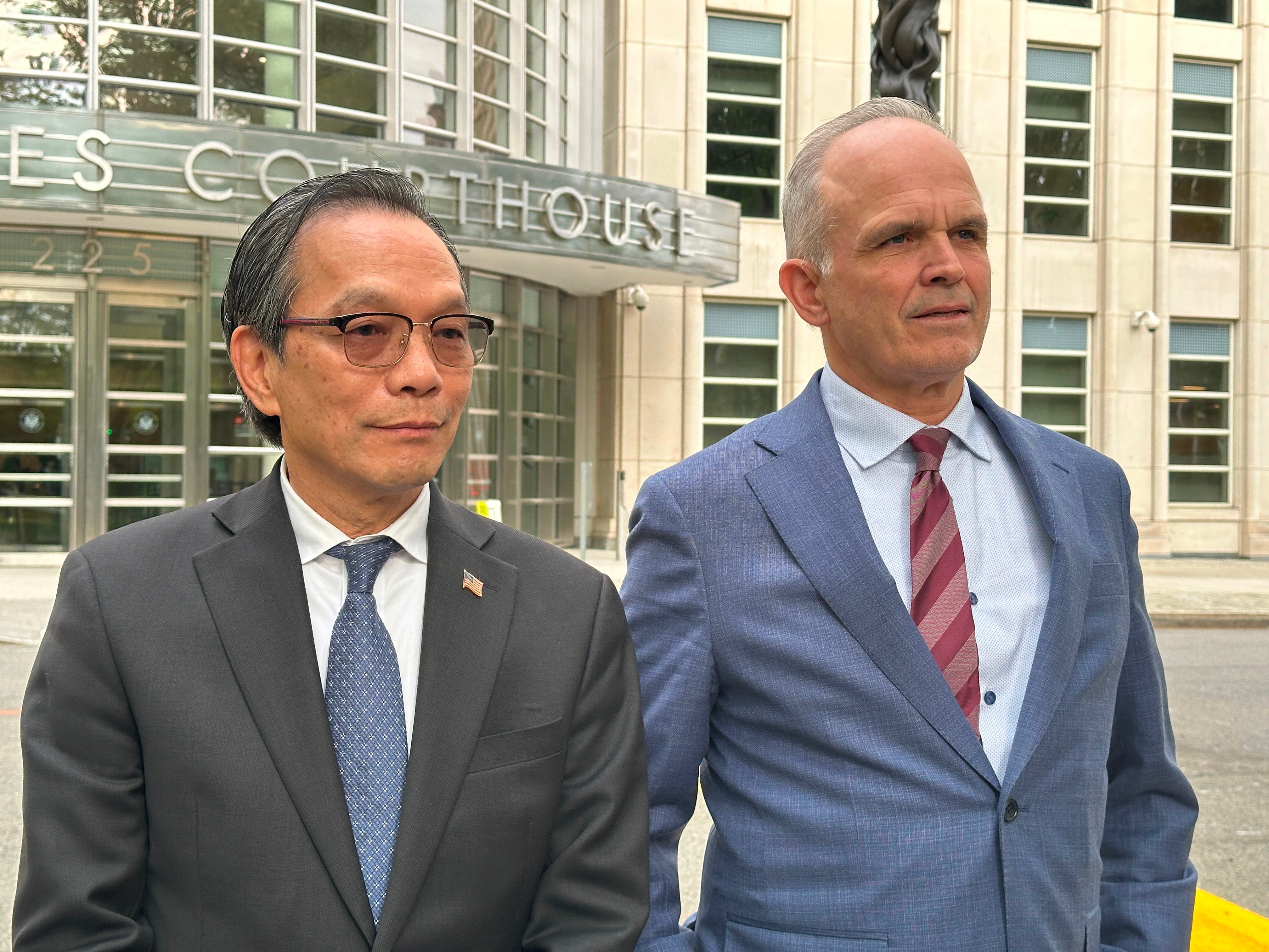 John Carman, Lu's lawyer, (right) says that he will appeal the verdict