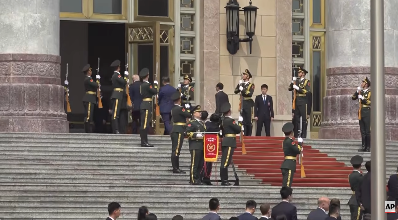 Donald Trump and Xi Jinping enter Great Hall of the People (AP)