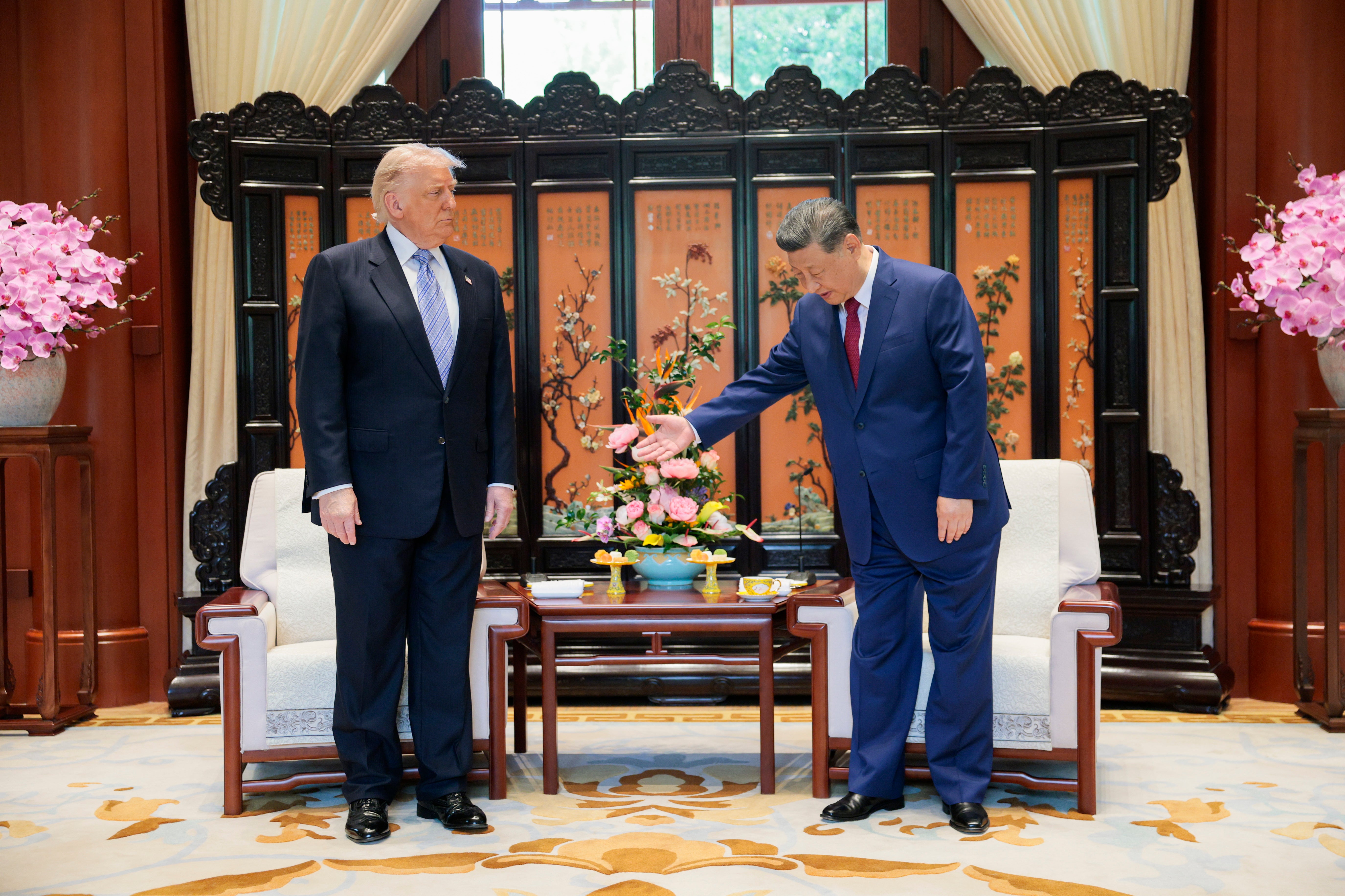 Trump and Xi sit down for talks