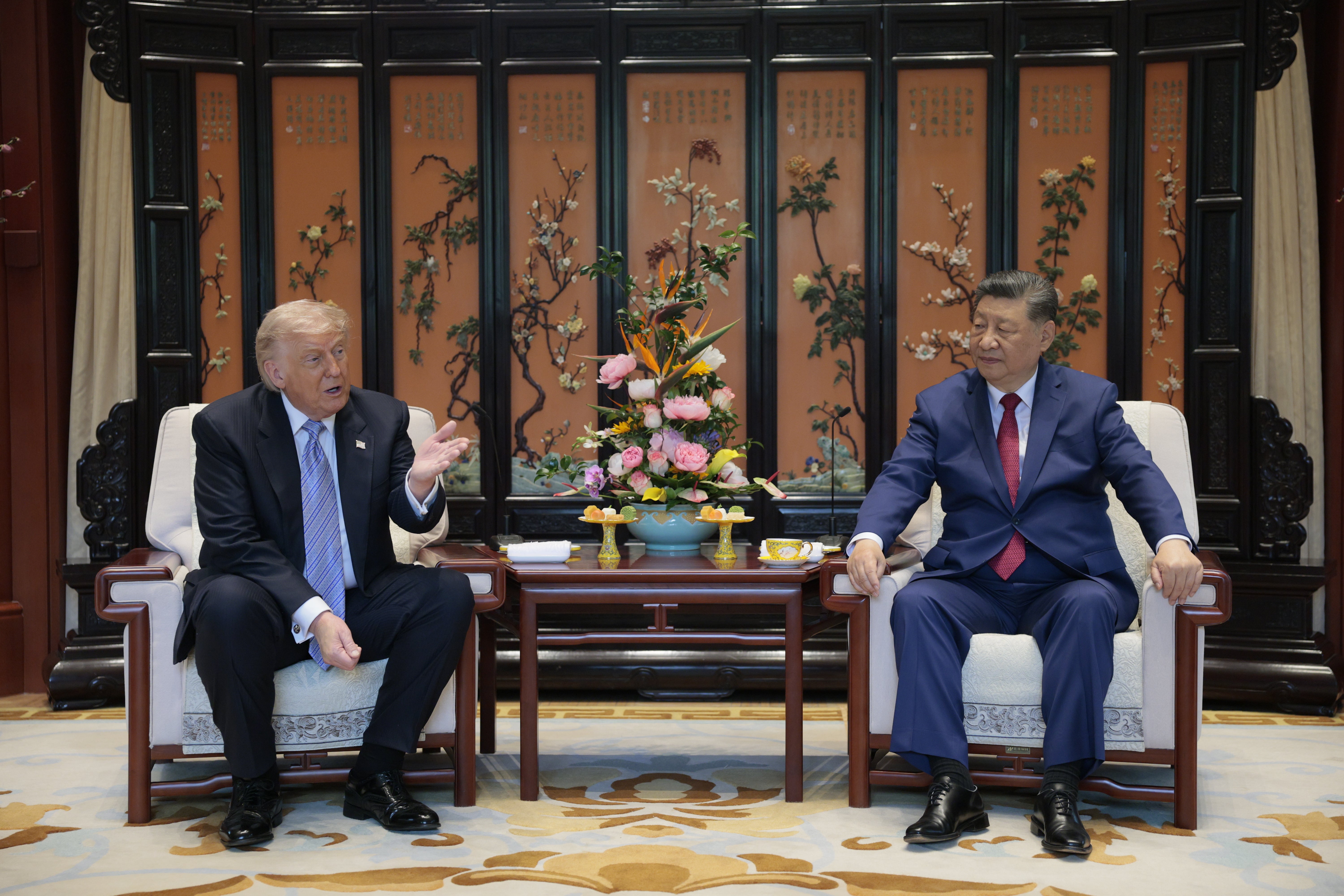 : U.S. President Donald Trump and Chinese President Xi Jinping meet on the sidelines of a visit to Zhongnanhai Garden