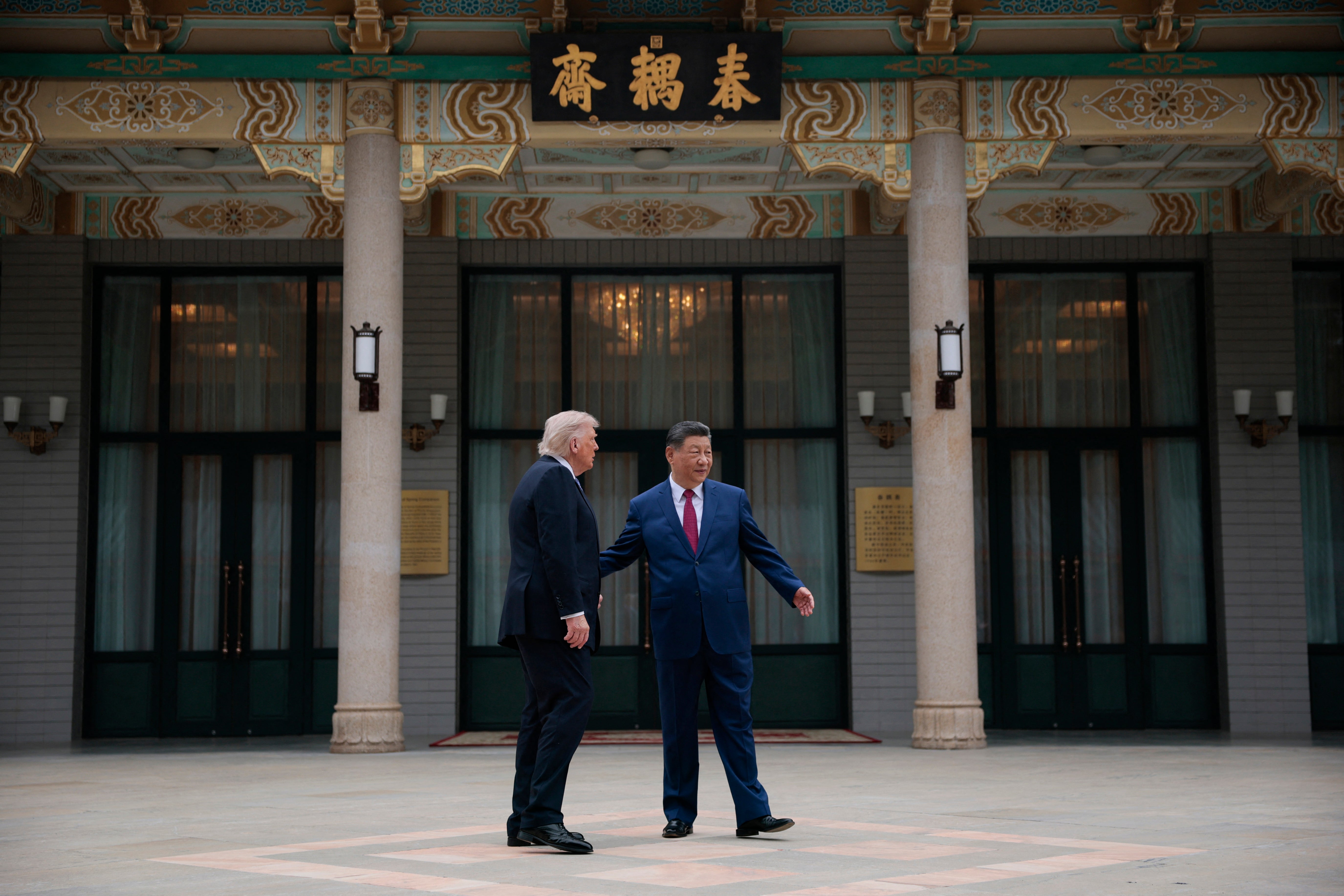 Xi guides Trump during a visit to Zhongnanhai Garden in Beijing