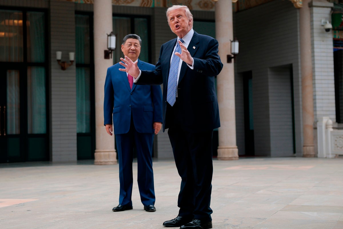 The Latest: Trump wraps up China visit and holds private meeting with Chinese leader Xi Jinping
