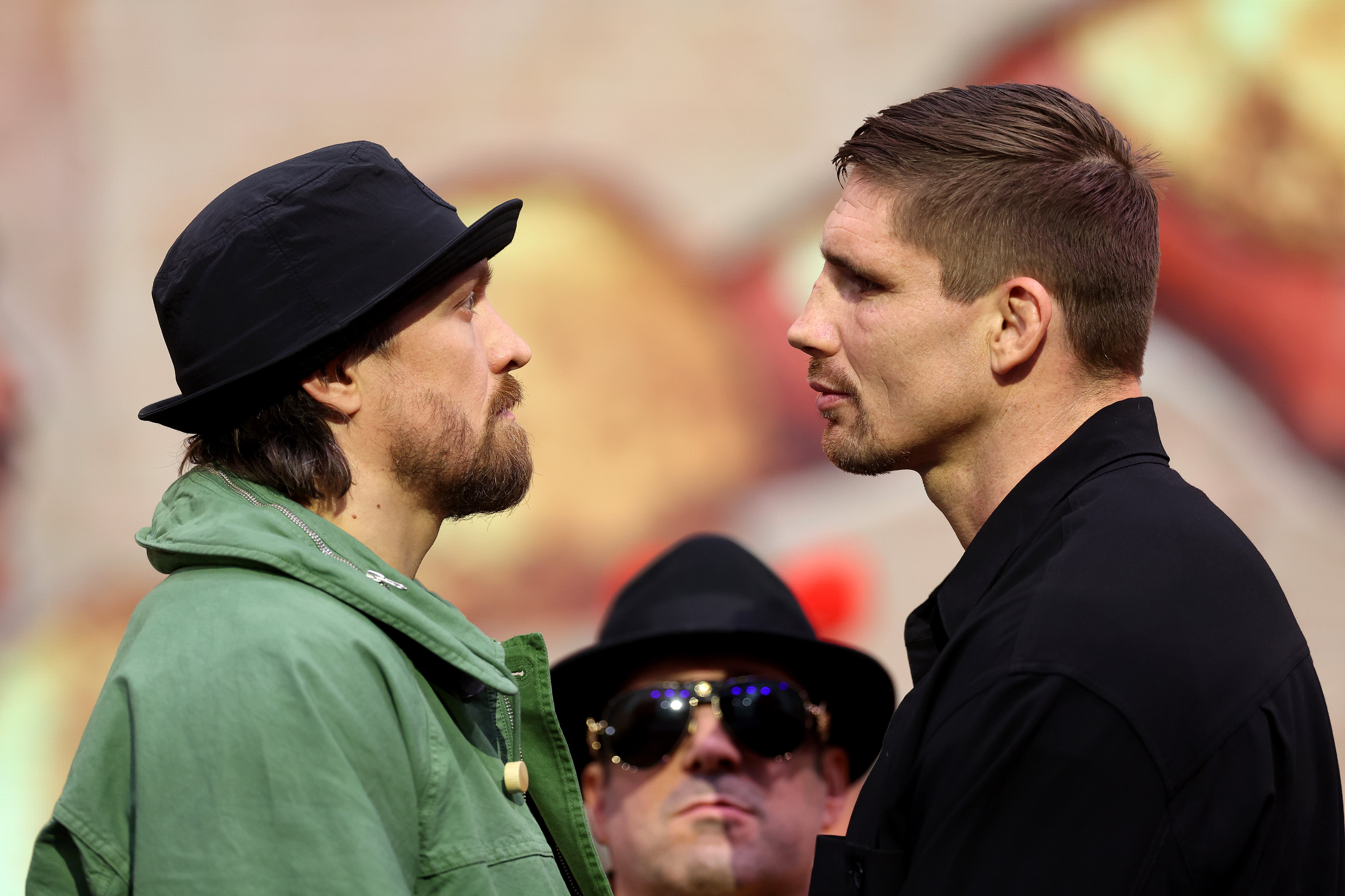 Oleksandr Usyk (left) facing off with kickboxing icon Rico Verhoeven