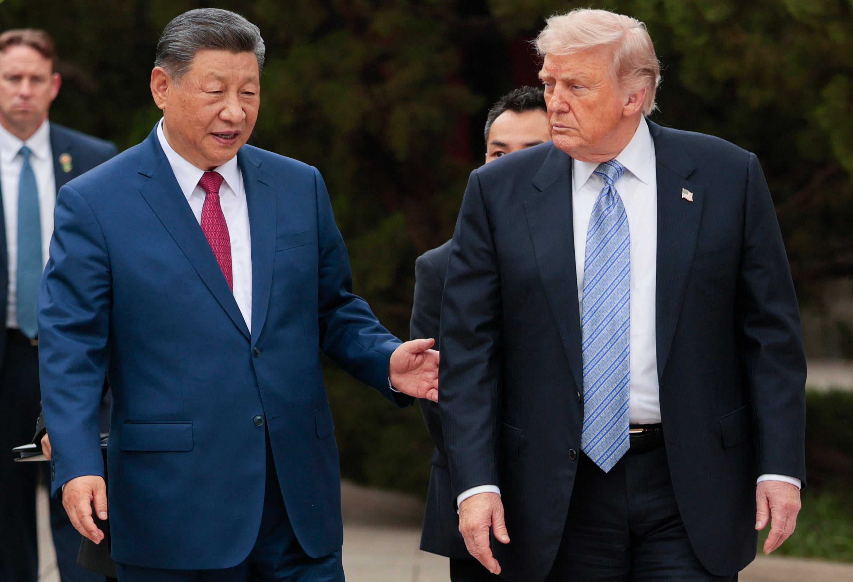 Trump heads home from China with a meagre goody bag from Xi