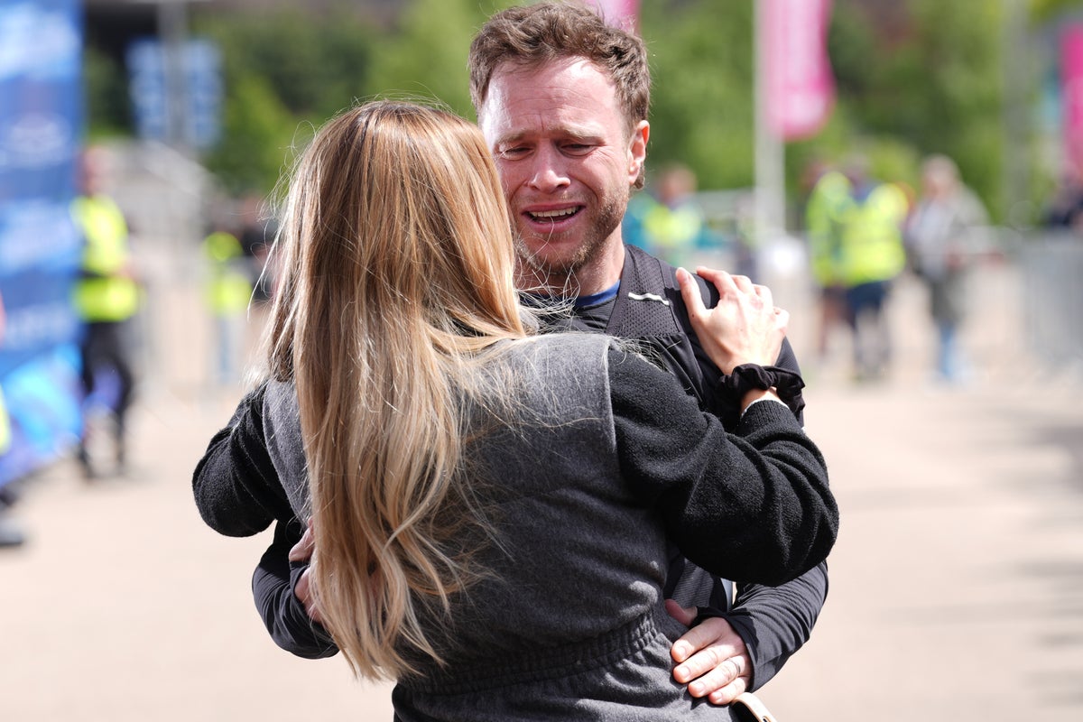 Olly Murs in tears after completing gruelling Soccer Aid challenge to raise huge six-figure sum for charity