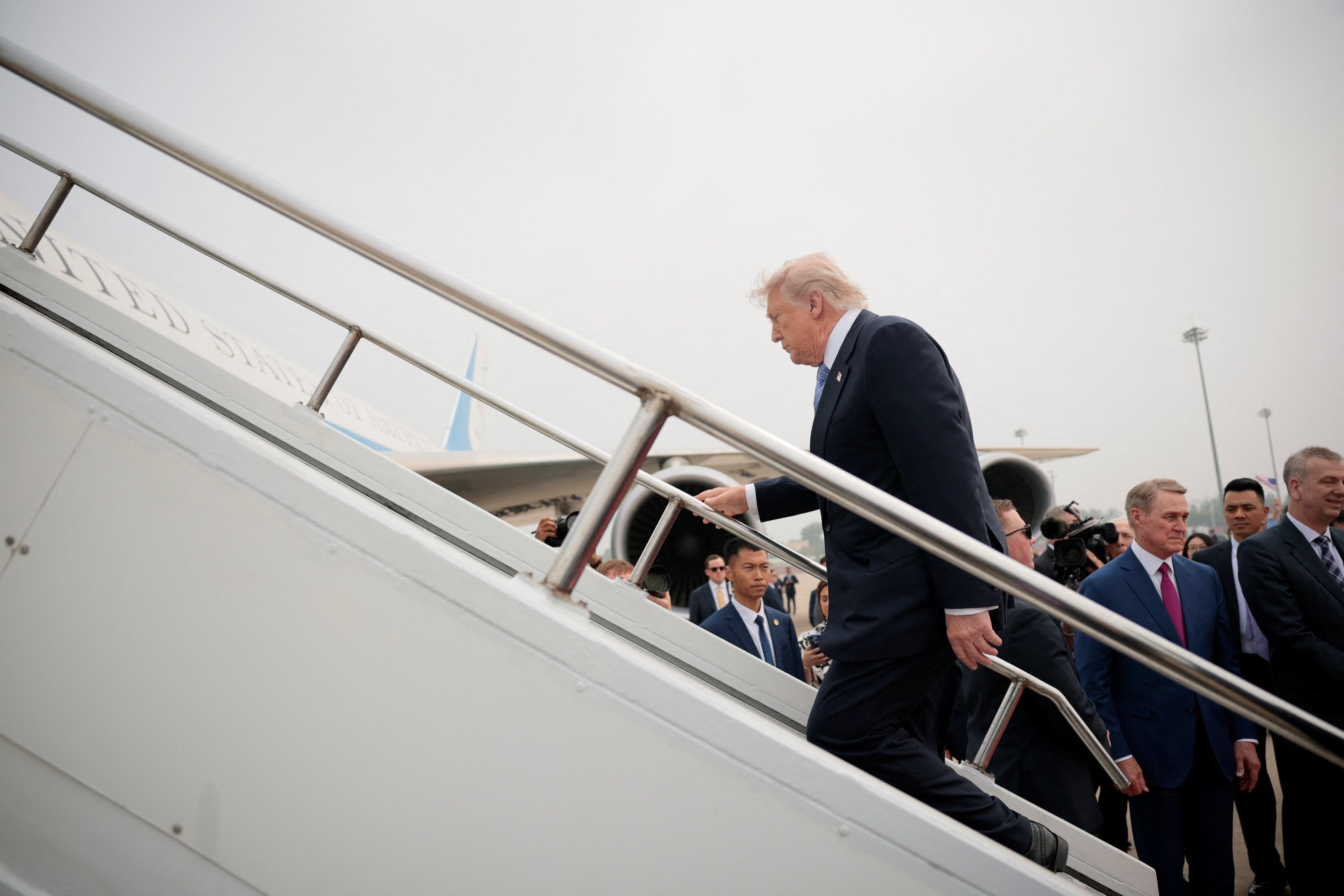 Before boarding Air Force One, US staffers and reporters were asked to discard items distributed by Chinese officials and burner phones used in China