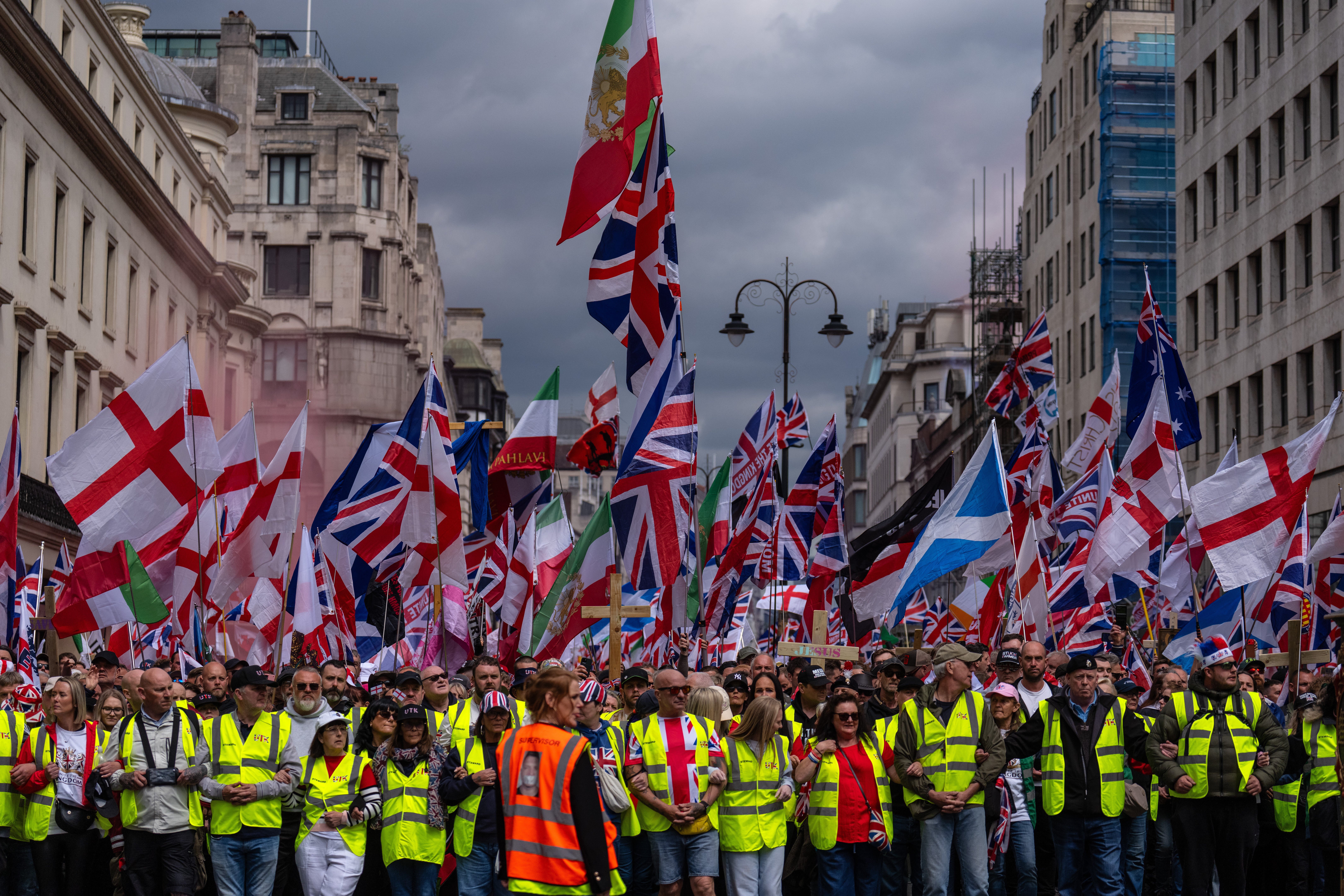 The England flag displayed by tens of thousands at the Unite the Kingdom rally in May (Getty)