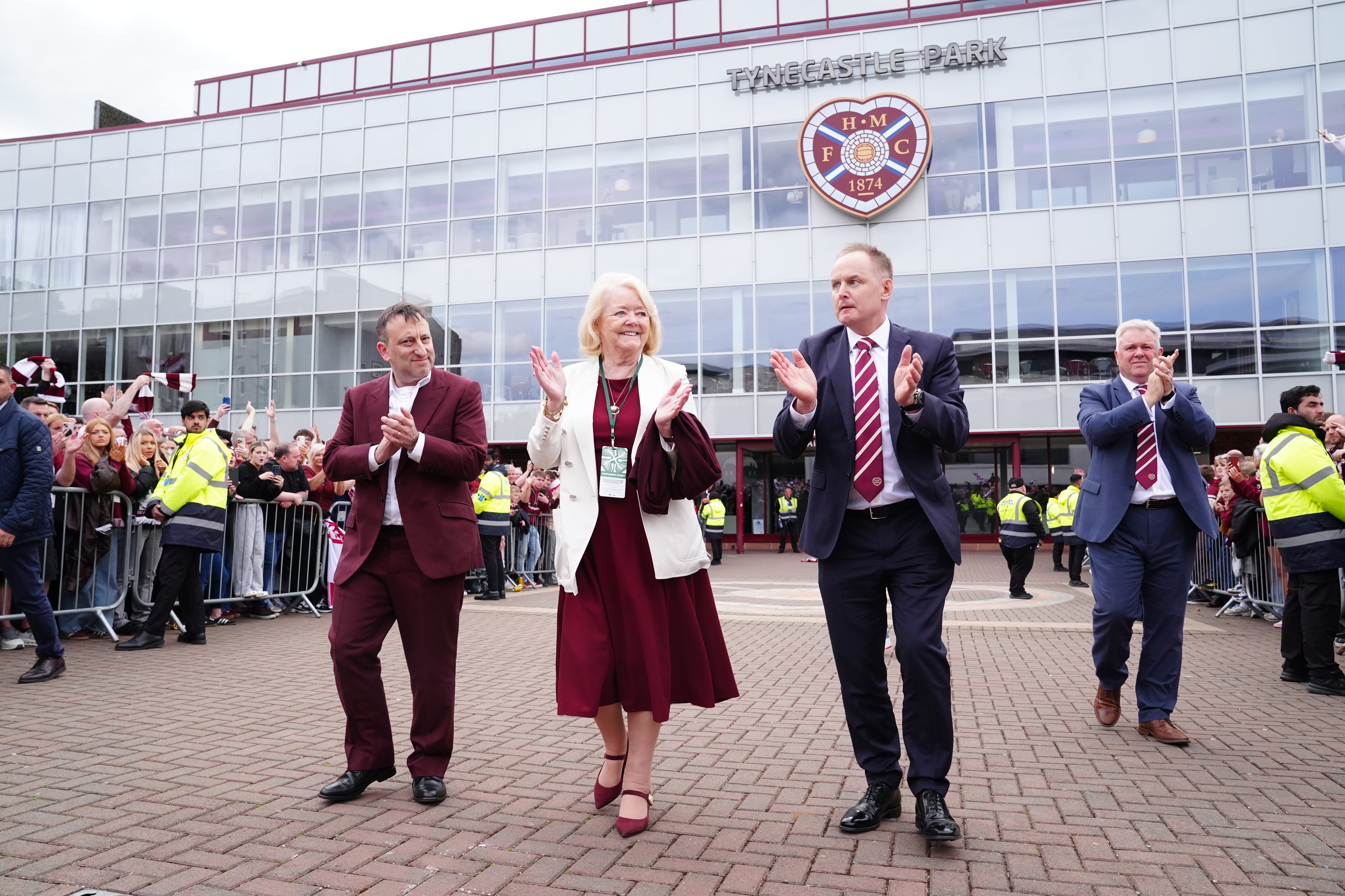 Hearts minority owner Tony Bloom (left) and former Heart of Midlothian owner Ann Budge acknowledge the fans at Tynecastle