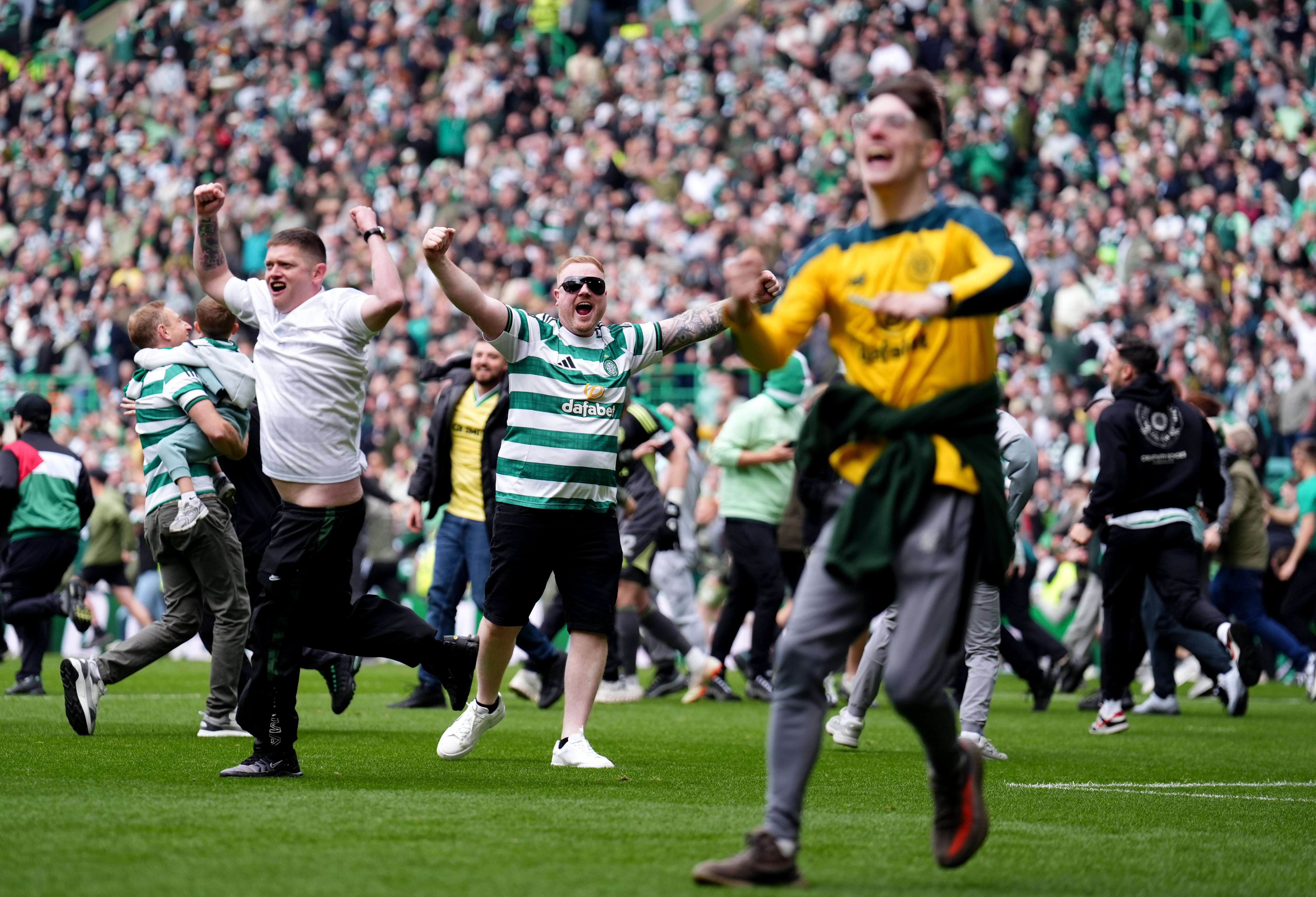 Celtic fans invaded the pitch after the third goal
