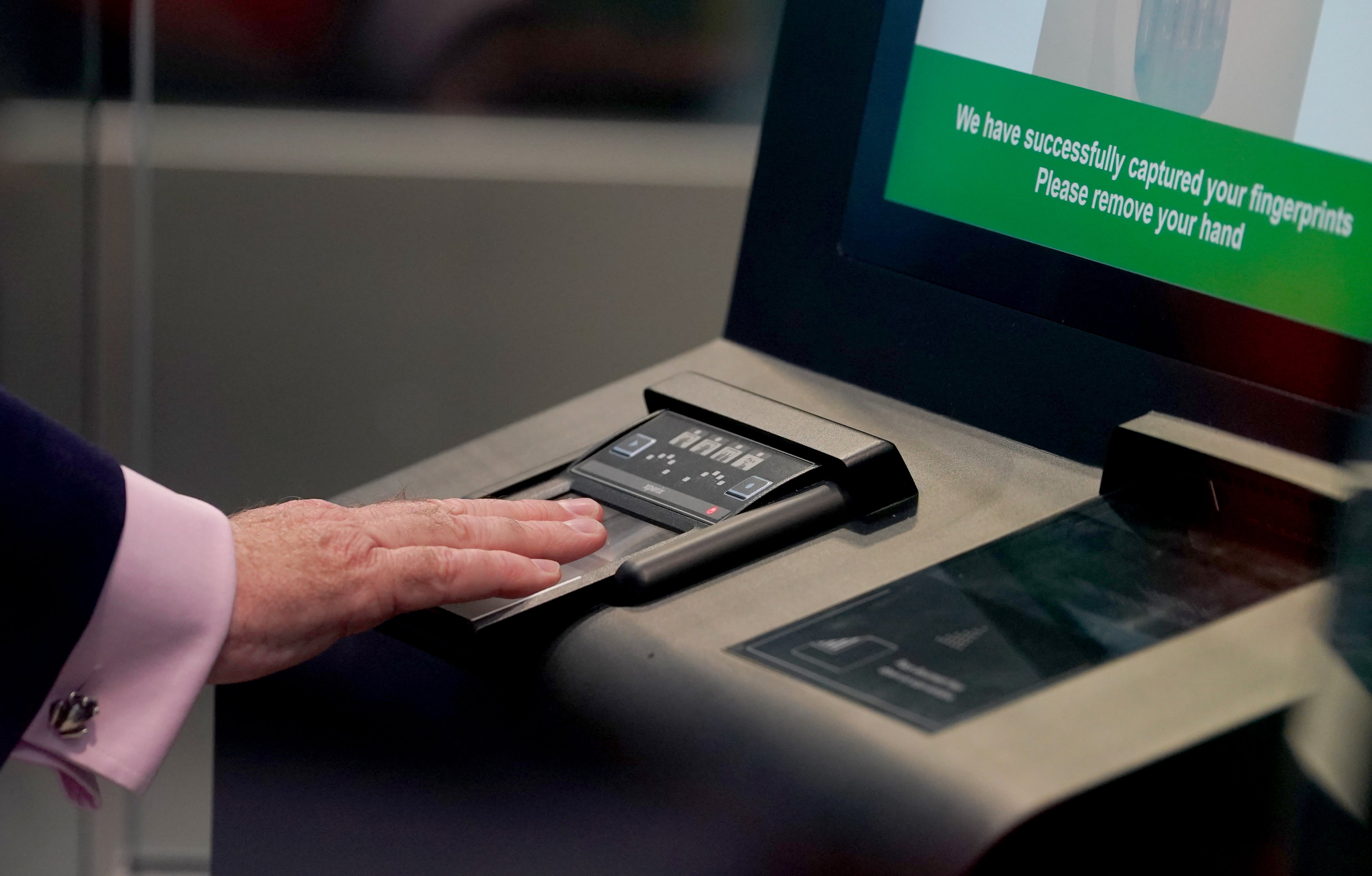 An identity and fingerprint terminal is used during a preview of the newly developed Entry Exit System (EES) zone at the Eurotunnel terminal in Folkestone, Kent