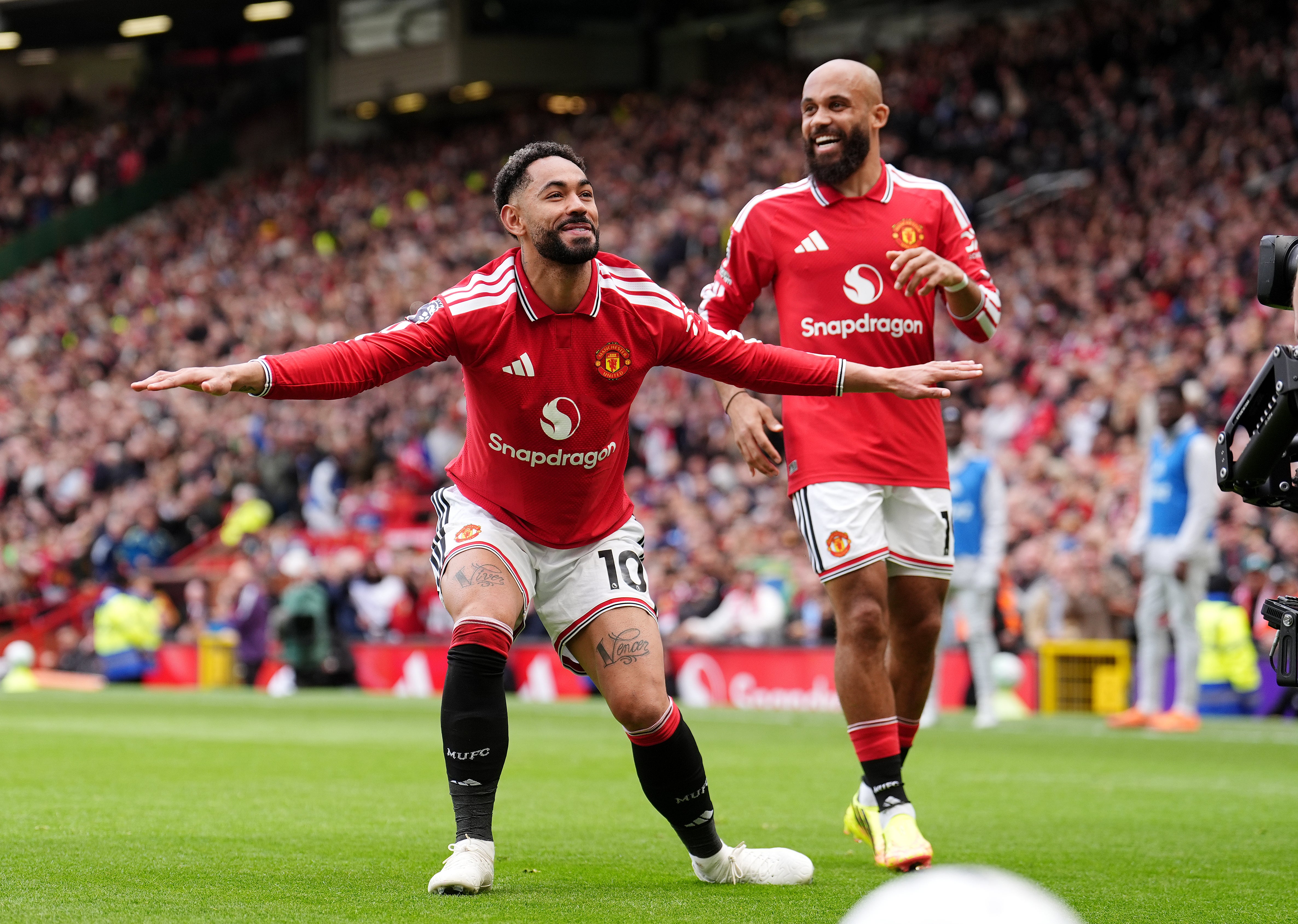 Manchester United’s Matheus Cunha (left) celebrates scoring their side’s second goal after a VAR check during the Premier League match at Old Trafford, Manchester. Picture date: Sunday May 17, 2026.