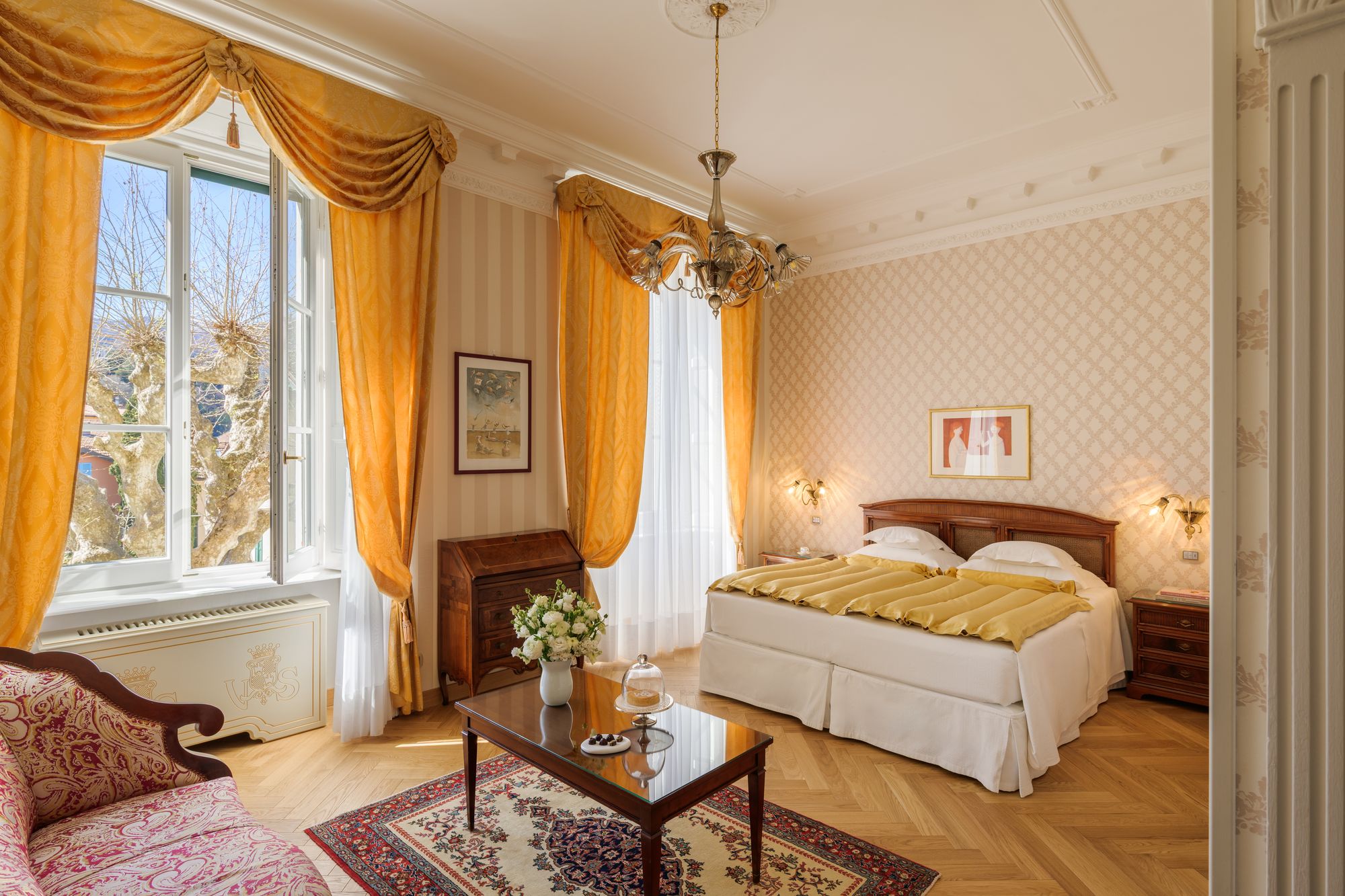 Decor combines gold detailing, silk bedspreads and ornate furniture