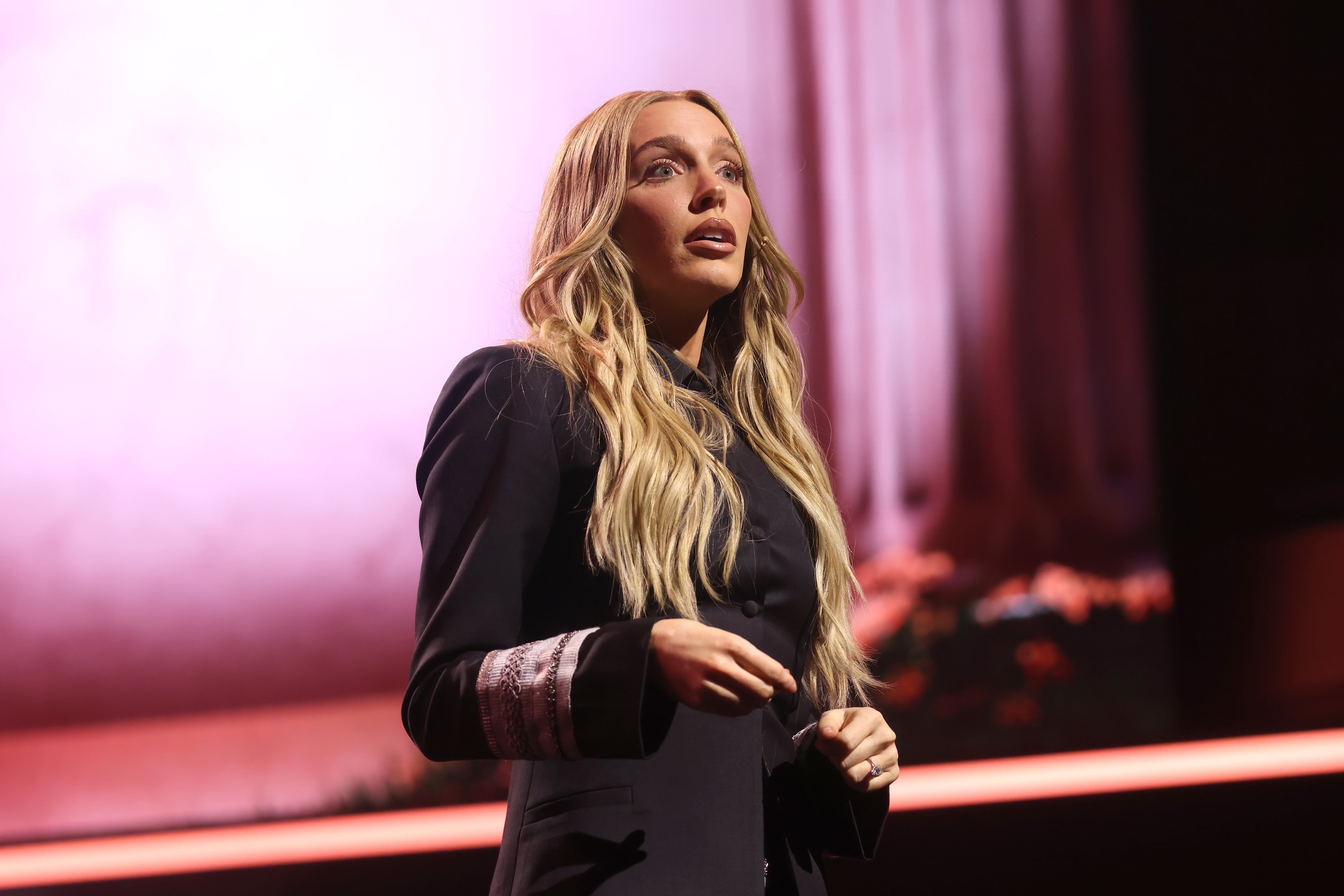 Alex Cooper speaks onstage during the YouTube Brandcast event at Lincoln Center