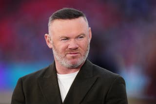 Wayne Rooney is in action for England