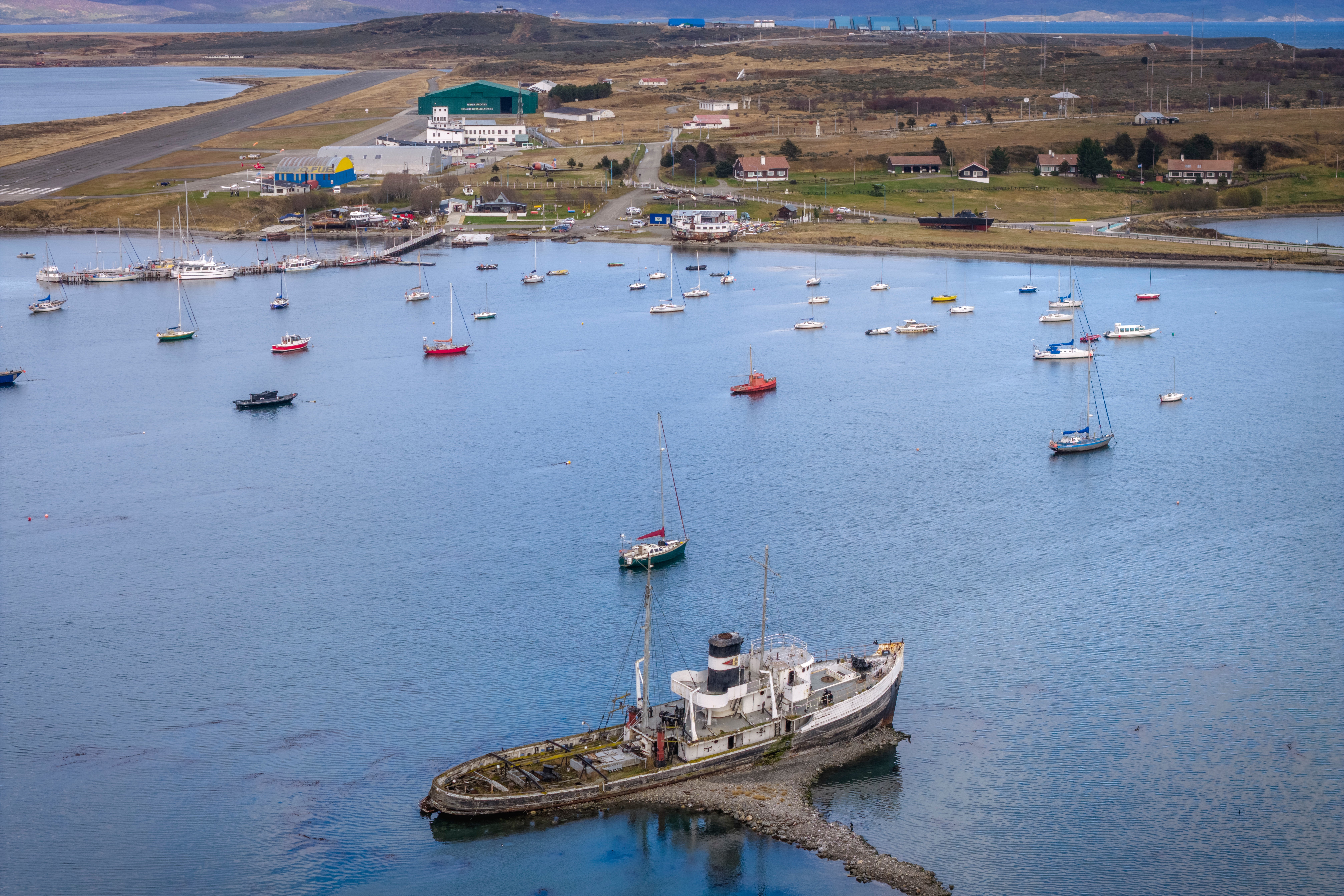 Boats sit in the dock in Ushuaia, Argentina, Thursday, May 14, 2026. (AP Photo/Joel Reyero)