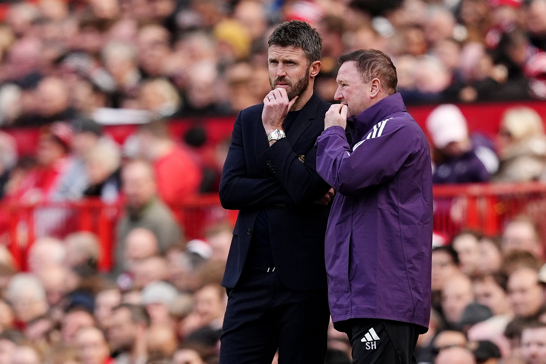 Carrick is aided by the experienced assistant coach Steve Holland (PA)