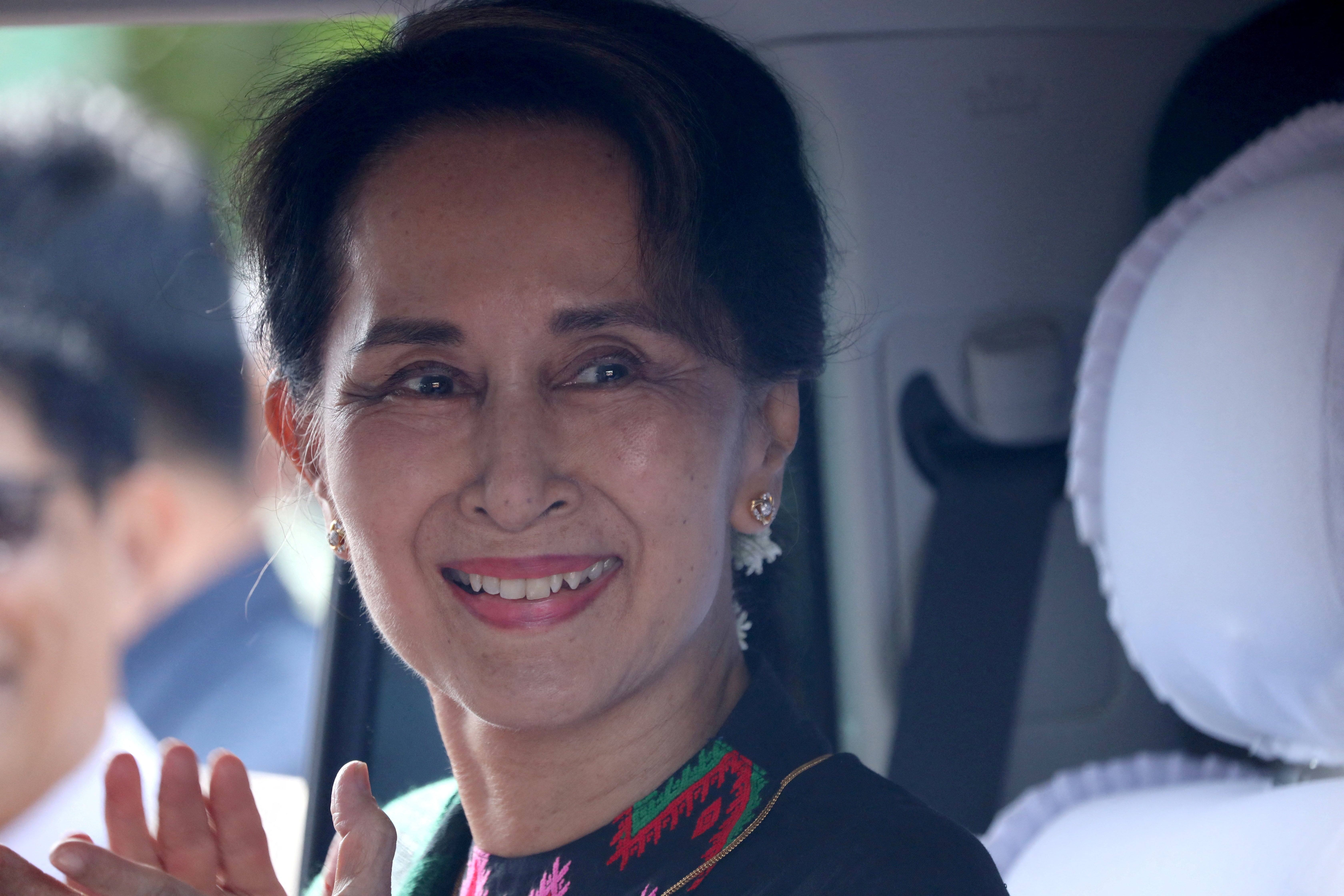 Aung San Suu Kyi arrives at a school in Kawhmu, Yangon, on 18 July 2019