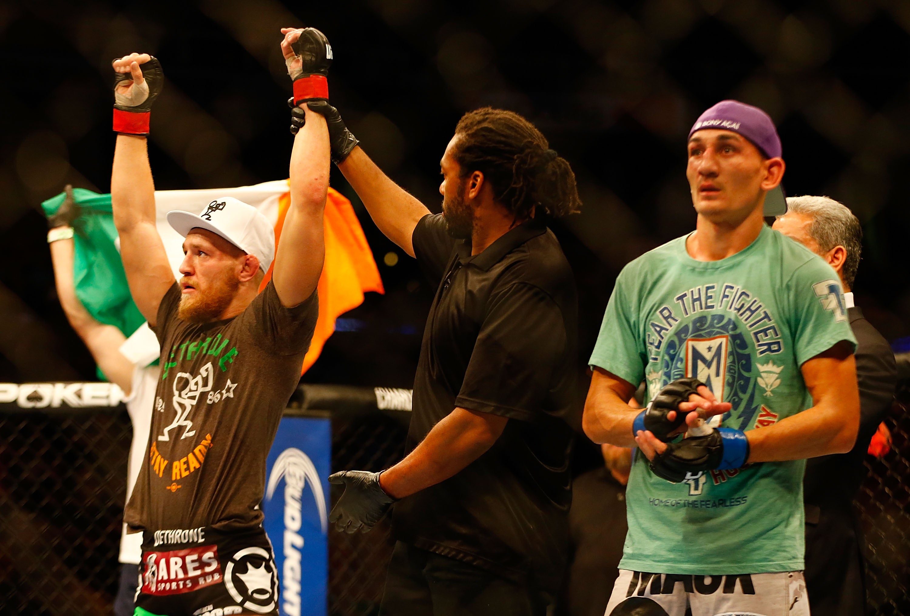 Conor McGregor (left) after his 2013 win over Max Holloway