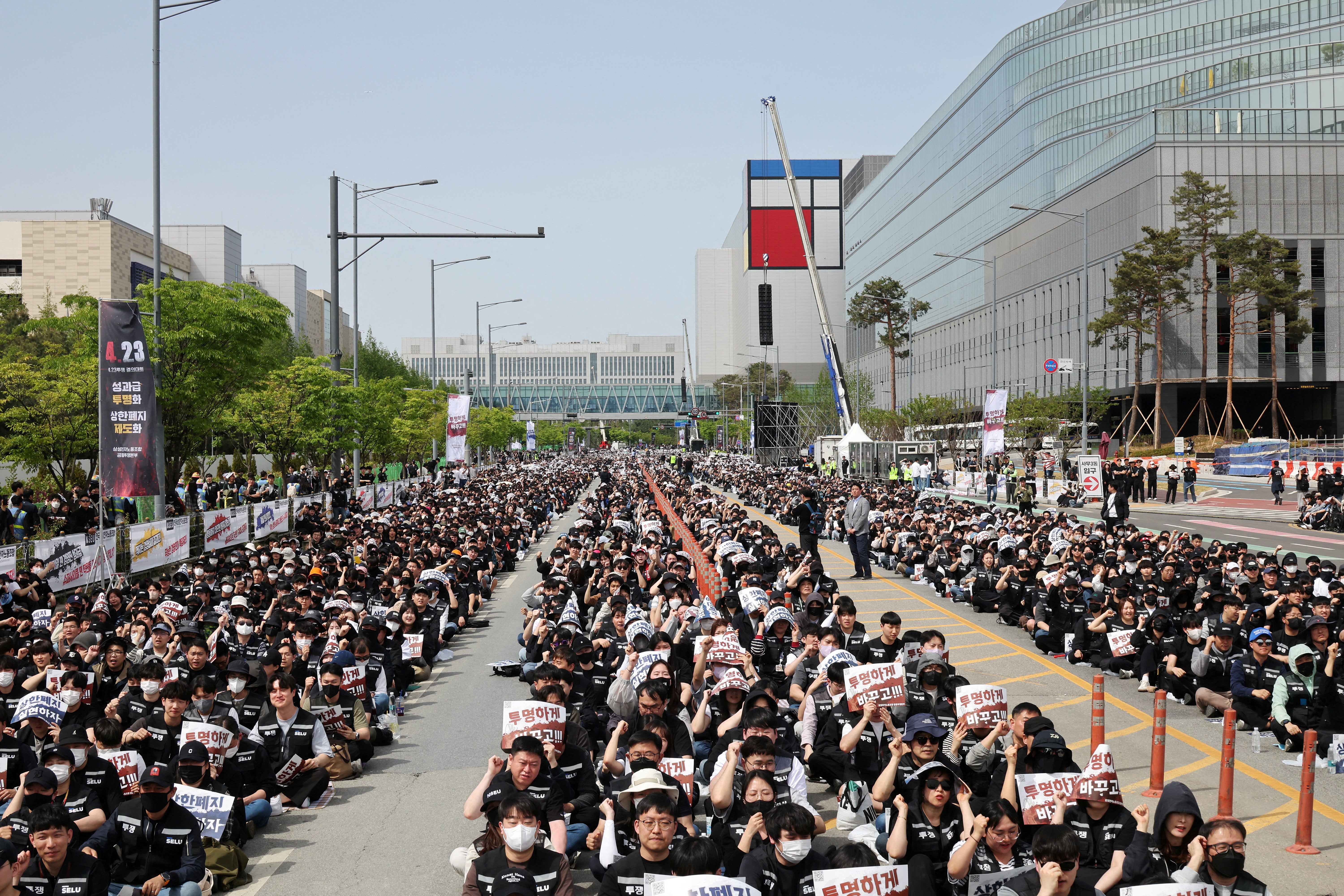 Samsung Electronics’ labour union members chant slogans during a protest against company’s compensation levels ahead of a planned lengthy strike in front of Samsung Electronics semiconductor plant in Pyeongtaek, South Korea