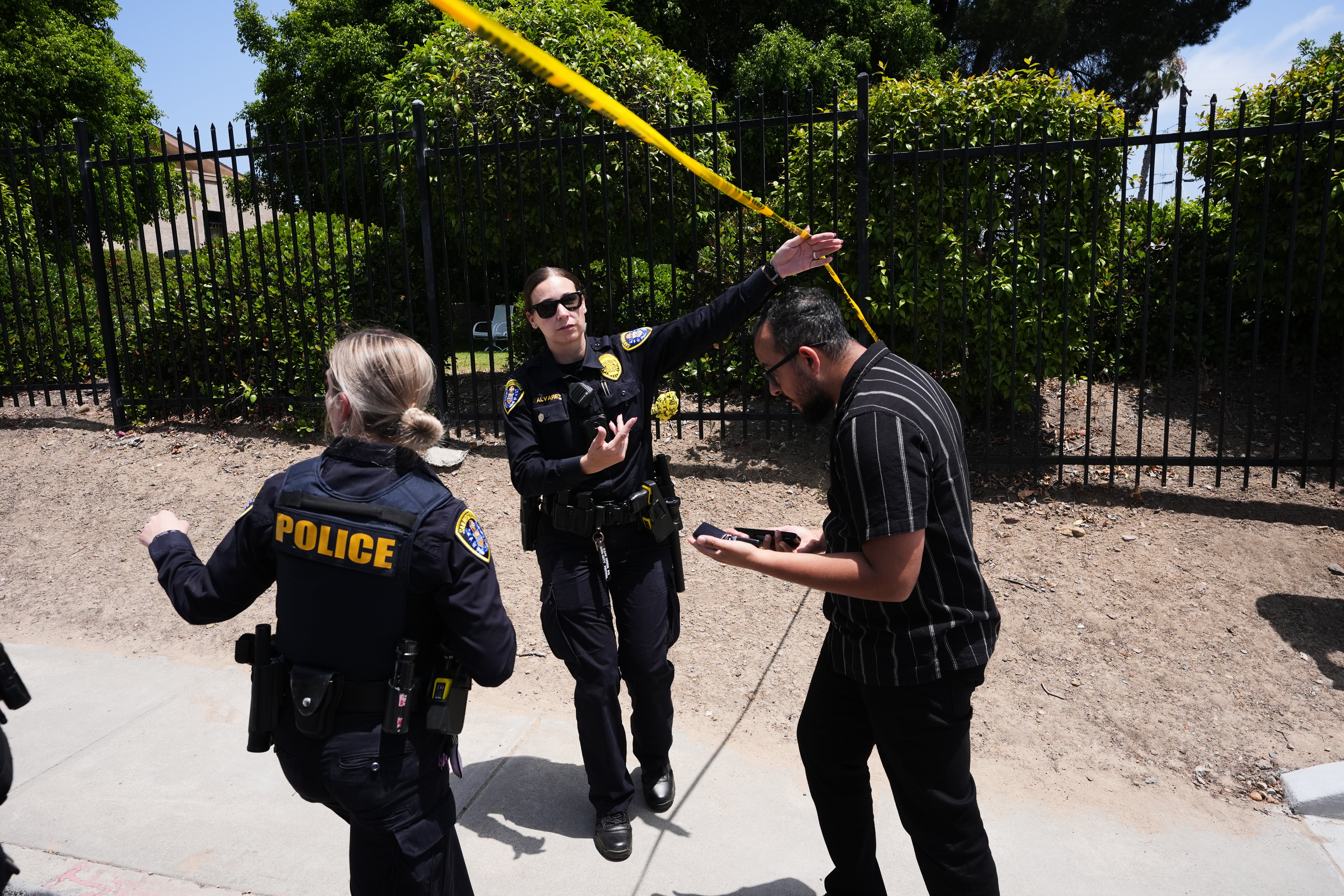 Police were reportedly seen outside a home thought to belong to a suspect’s family member