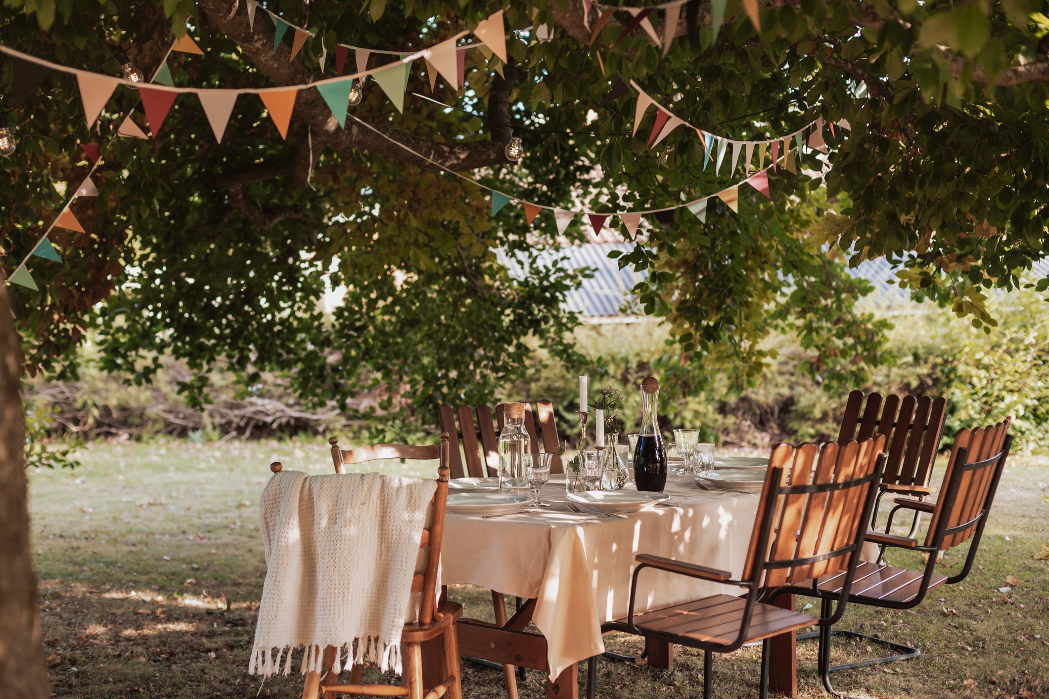 Transform your outdoor space with lights, lanterns and decorations to create a celebratory atmosphere