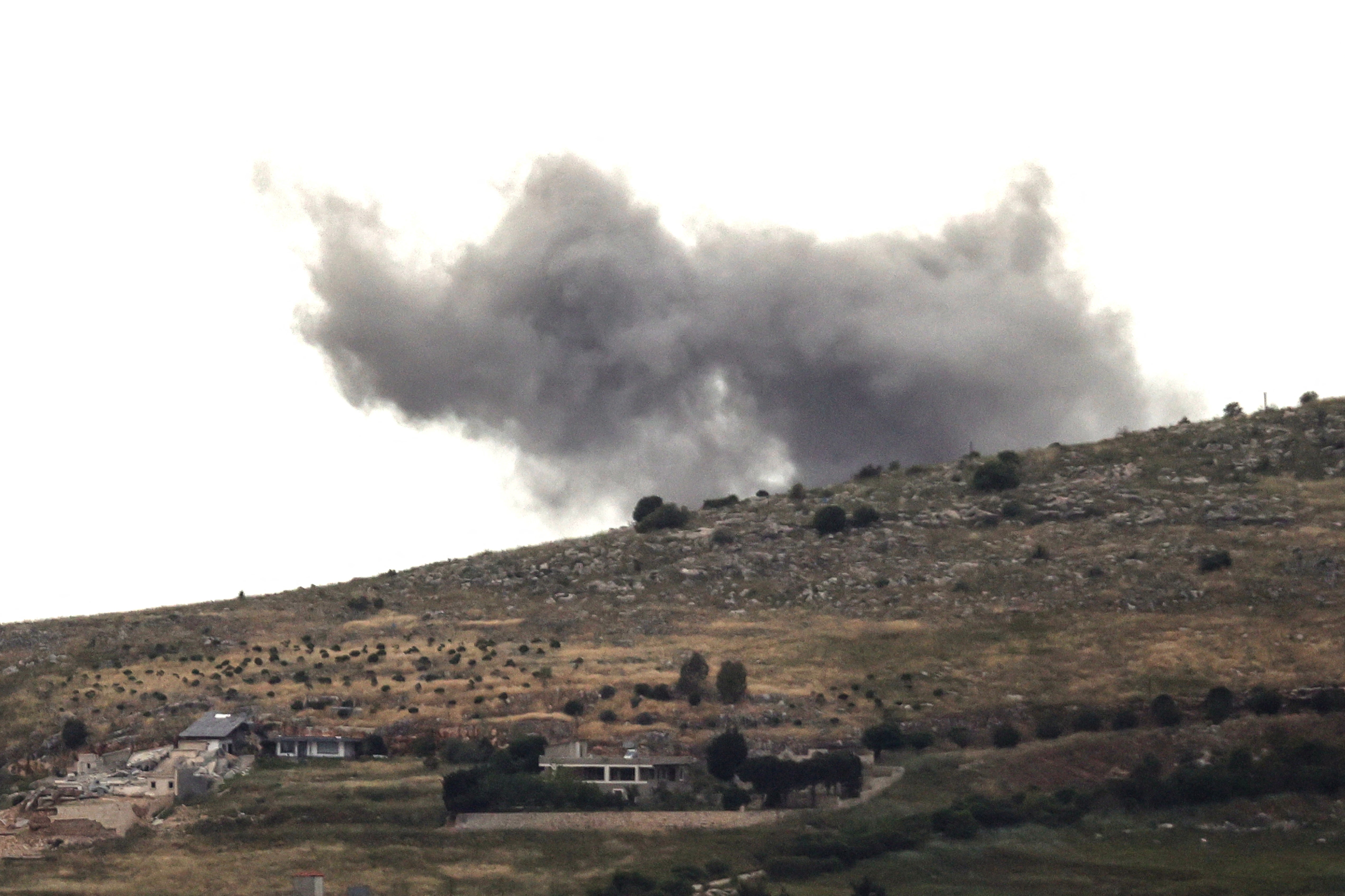 Smoke billows after an Israeli airstrike on the village of Kfar Tibnit in the southern Nabatieh district, Lebanon, on Monday (AFP/Getty)
