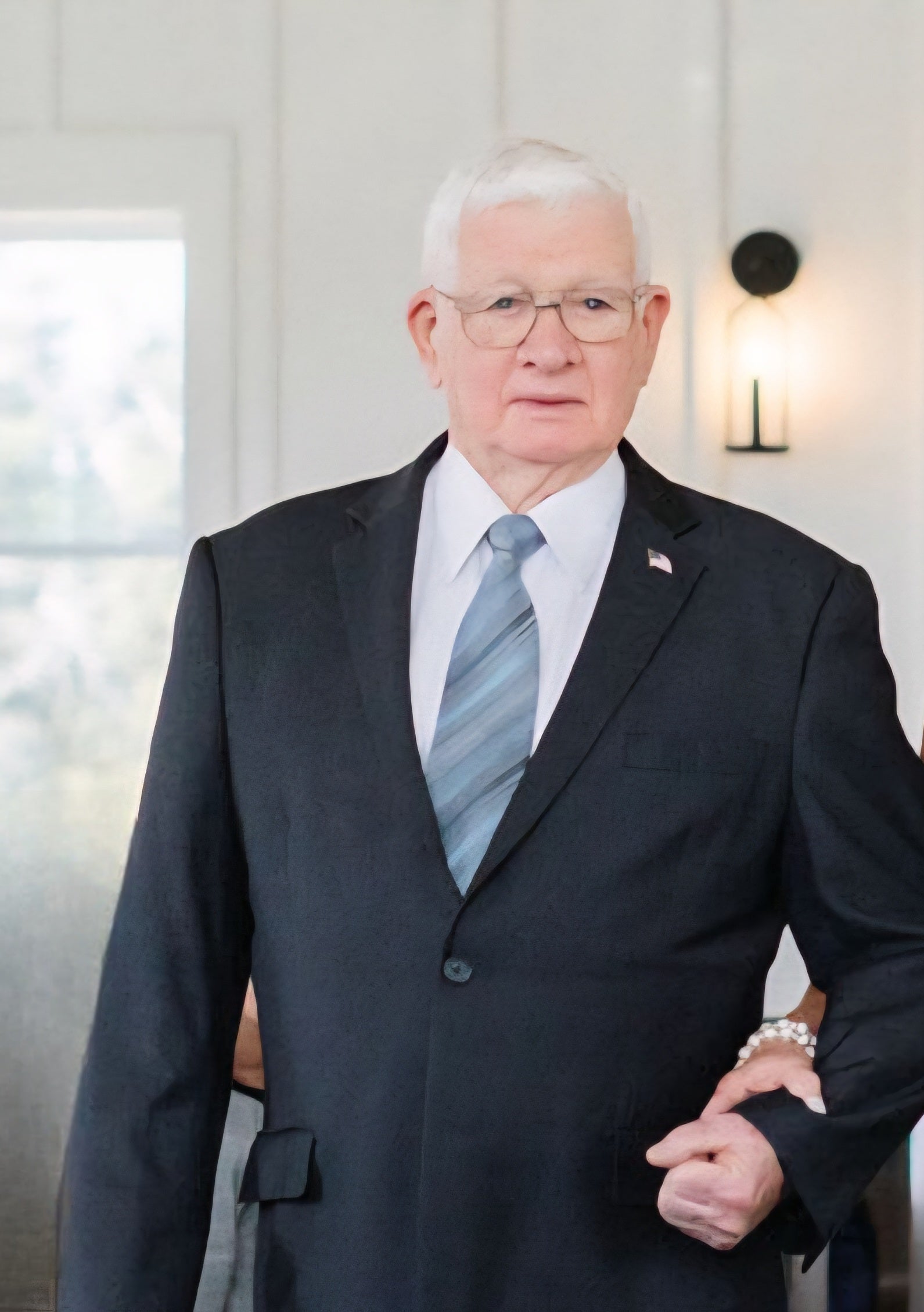 John Allen Fletcher, seen here attending a wedding in March 2025, was in excellent health, his daughter said. She is now suing JetBlue after Fletcher suffered a stroke upon landing, and was allegedly all but ignored by the cabin crew (Provided)