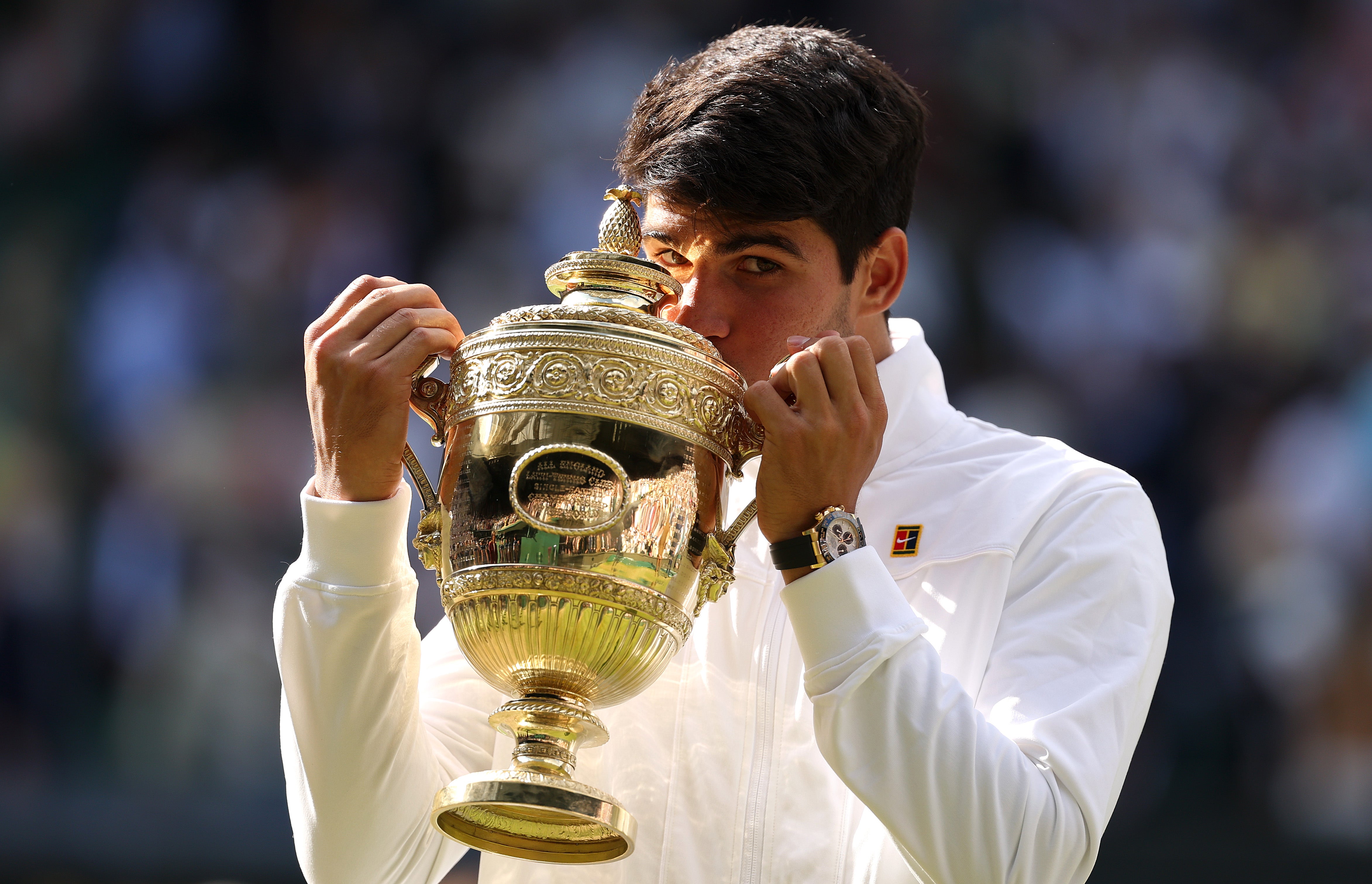 Alcaraz with the Wimbledon trophy in 2024