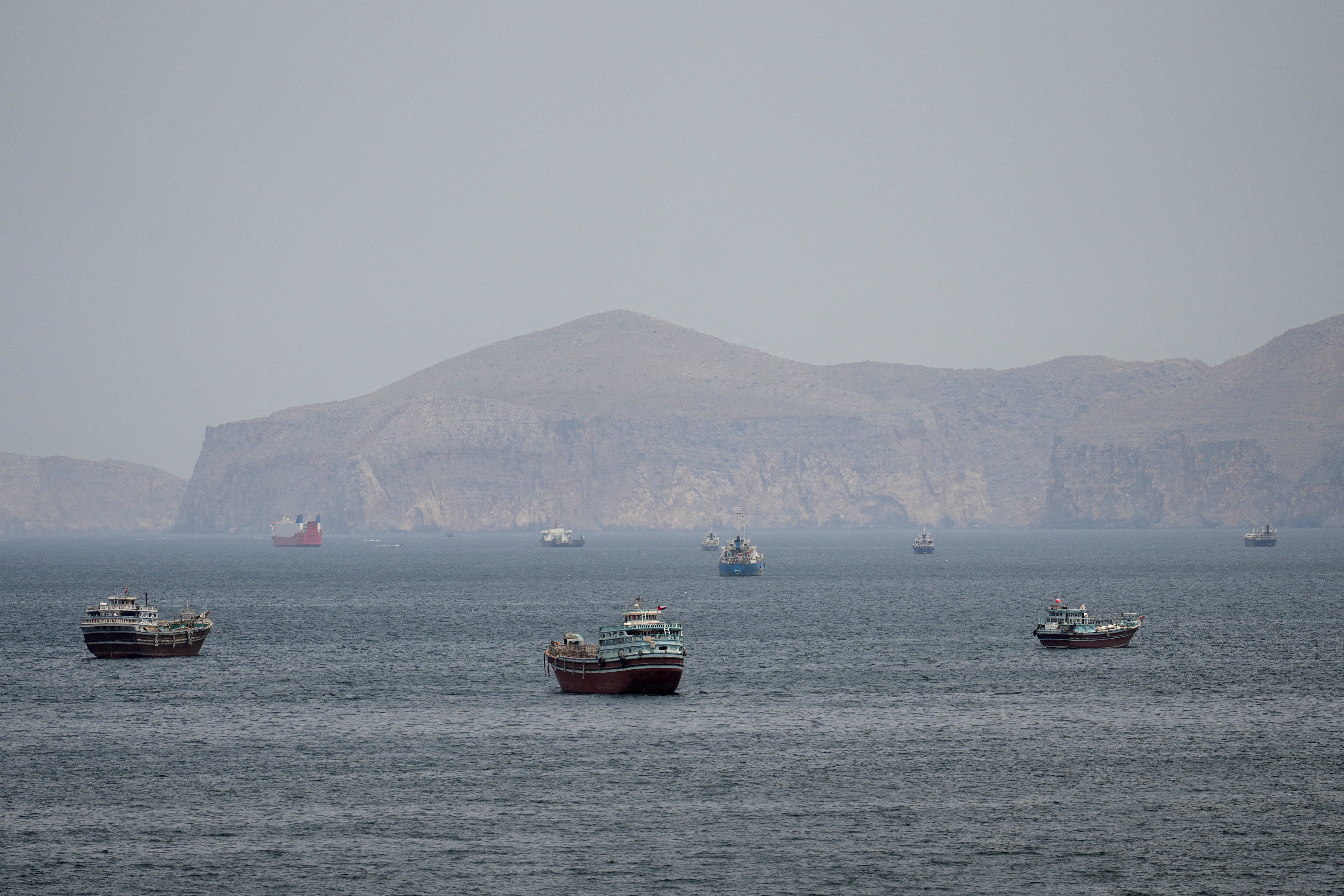 Ships and boats in the Strait of Hormuz, one voter said that Trump's actions in Iran have 'exacerbated' gas issues at home