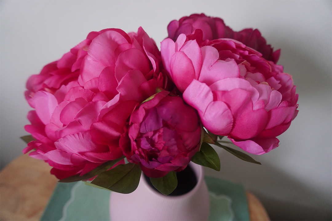 These faux peonies look spectacular in a range of vases (Eve Smallman/The Independent)