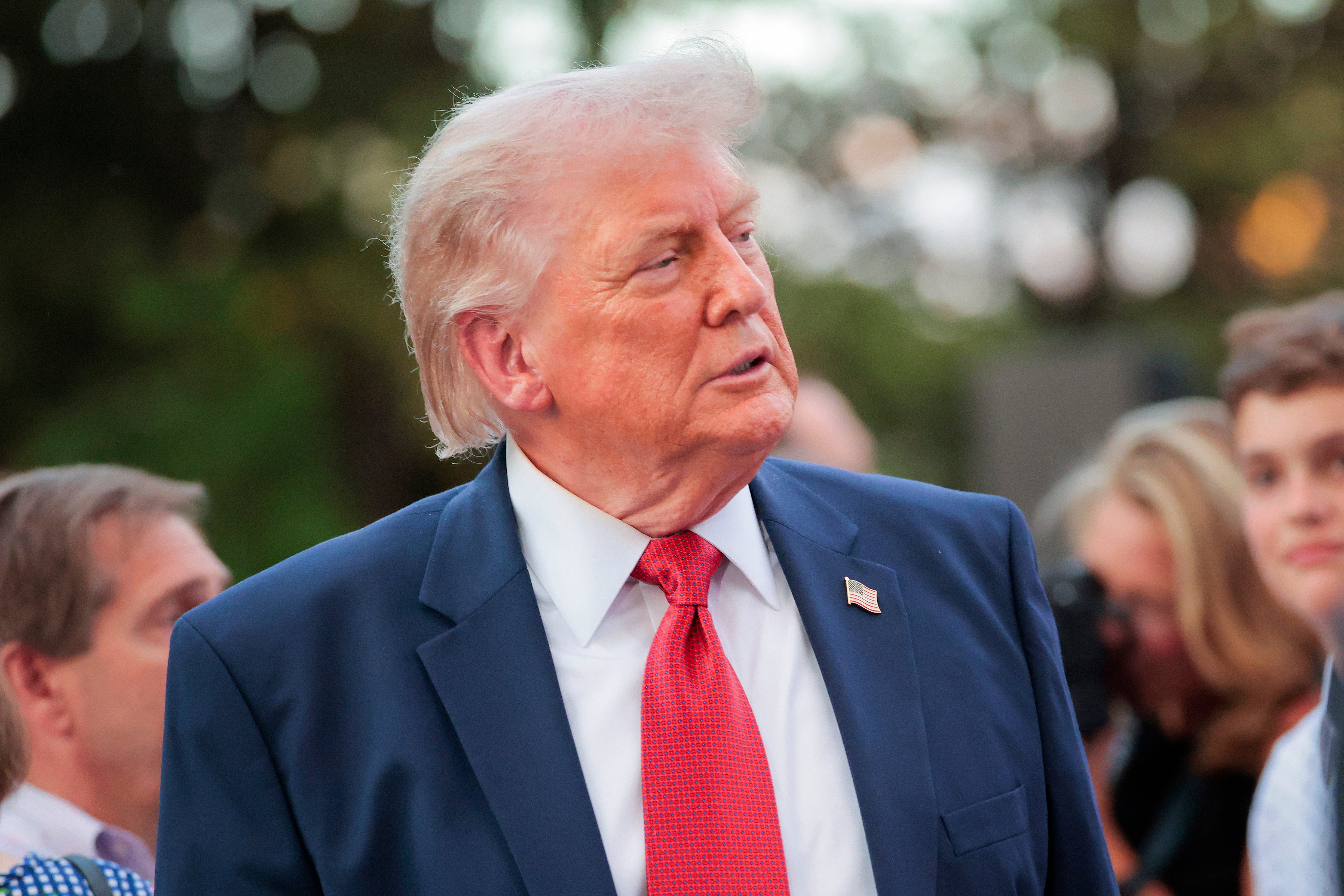 A majority of voters have said Donald Trump is using his office for personal gain, as the president promised that 'America is thriving'
