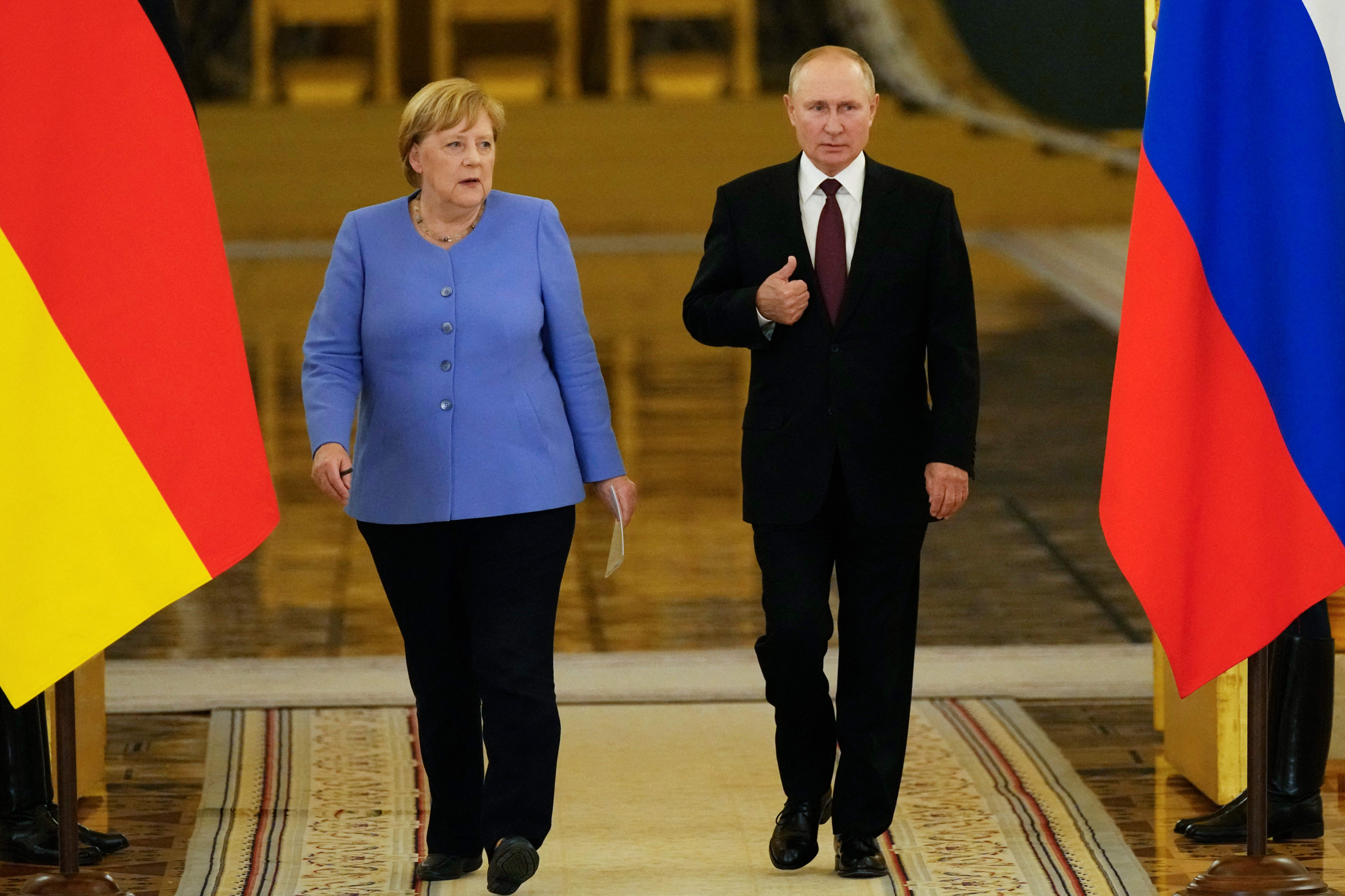 Vladimir Putin (R) and Angela Merkel at the Kremlin in Moscow on August 20, 2021 (AFP/Getty)