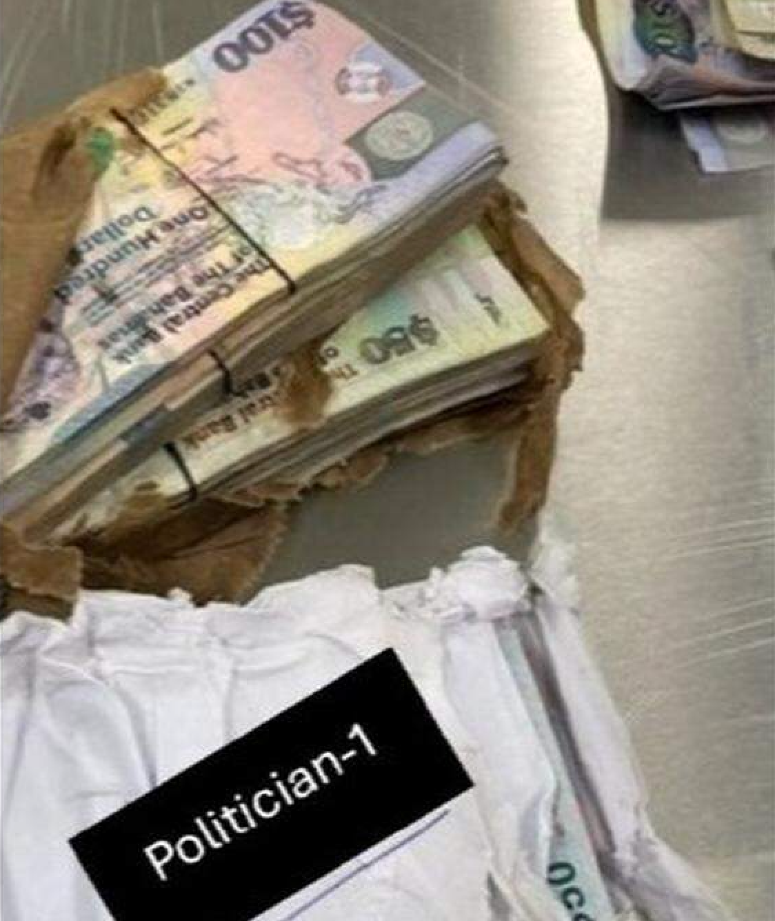 The brown paper bag of cash was reportedly labeled with the name of a Bahamian politician. The politician’s name was described in court documents only as 'Politician-1' (U.S. Drug Enforcement Administration)