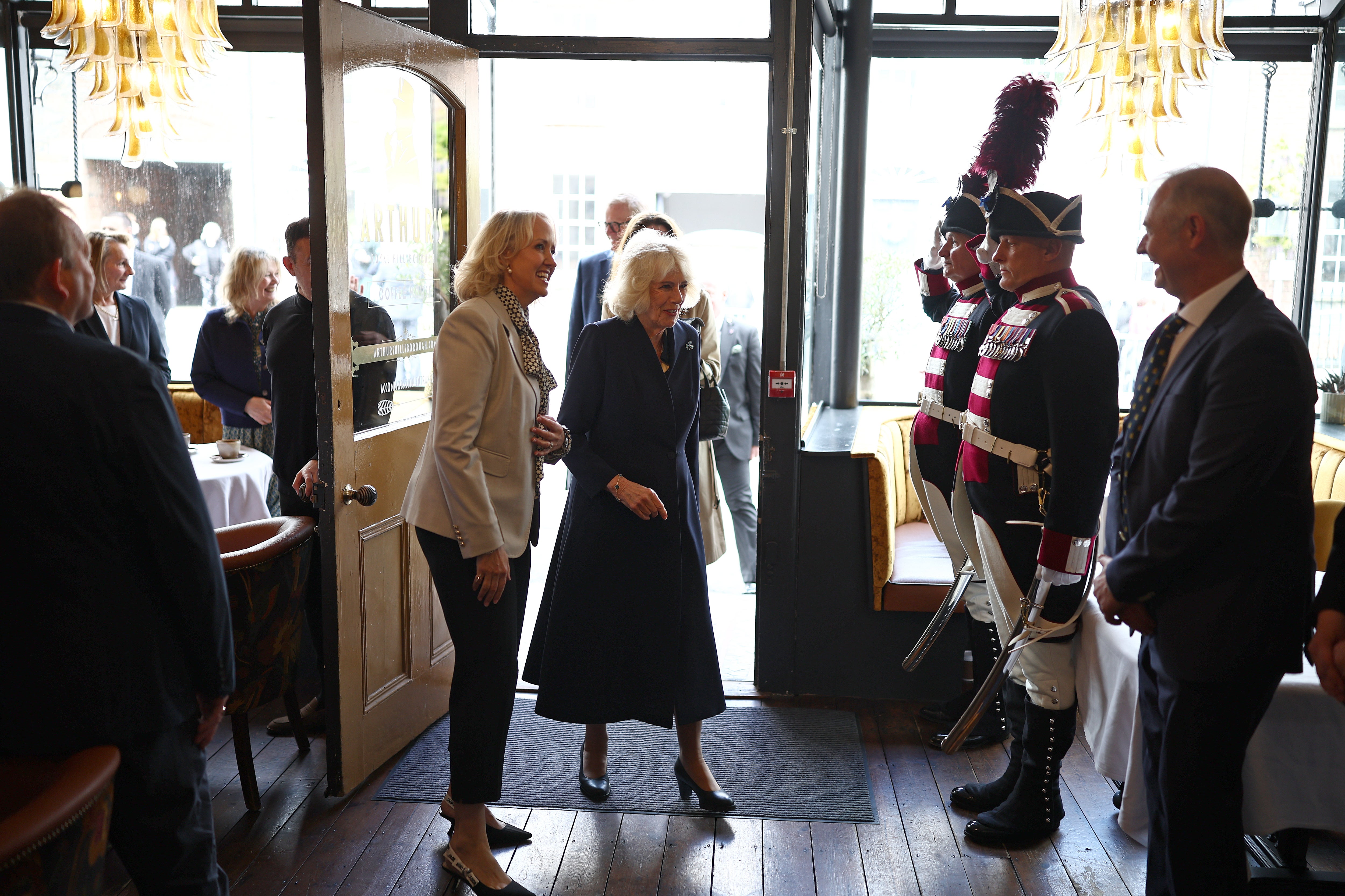 Camilla met staff, customers and residents during her visit to Arthur’s Coffee House (Henry Nicholls/PA)
