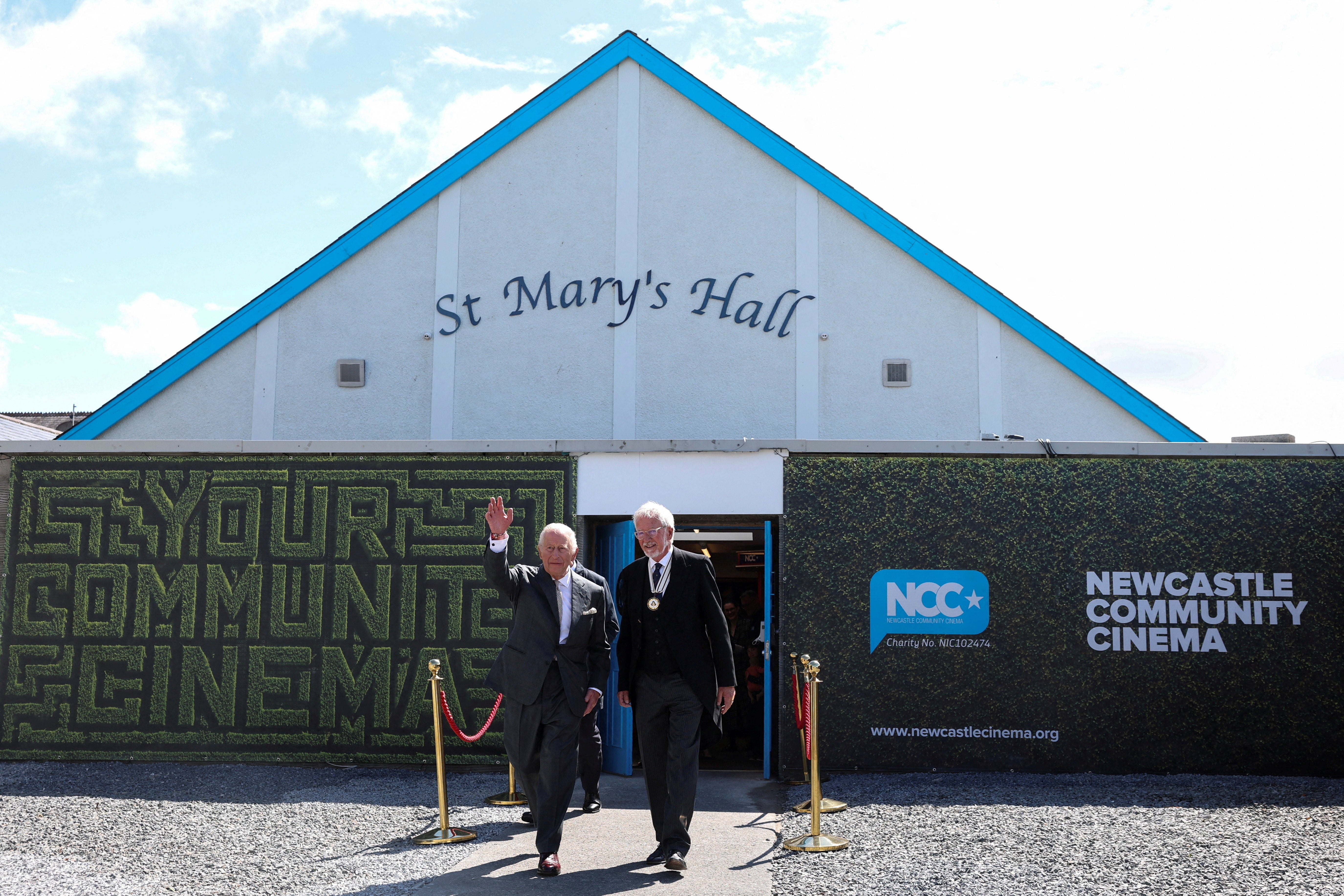 King Charles hailed 'amazing' foodbank volunteers when he packed boxes of groceries for those in need during his second day in Ulster (Reuters)