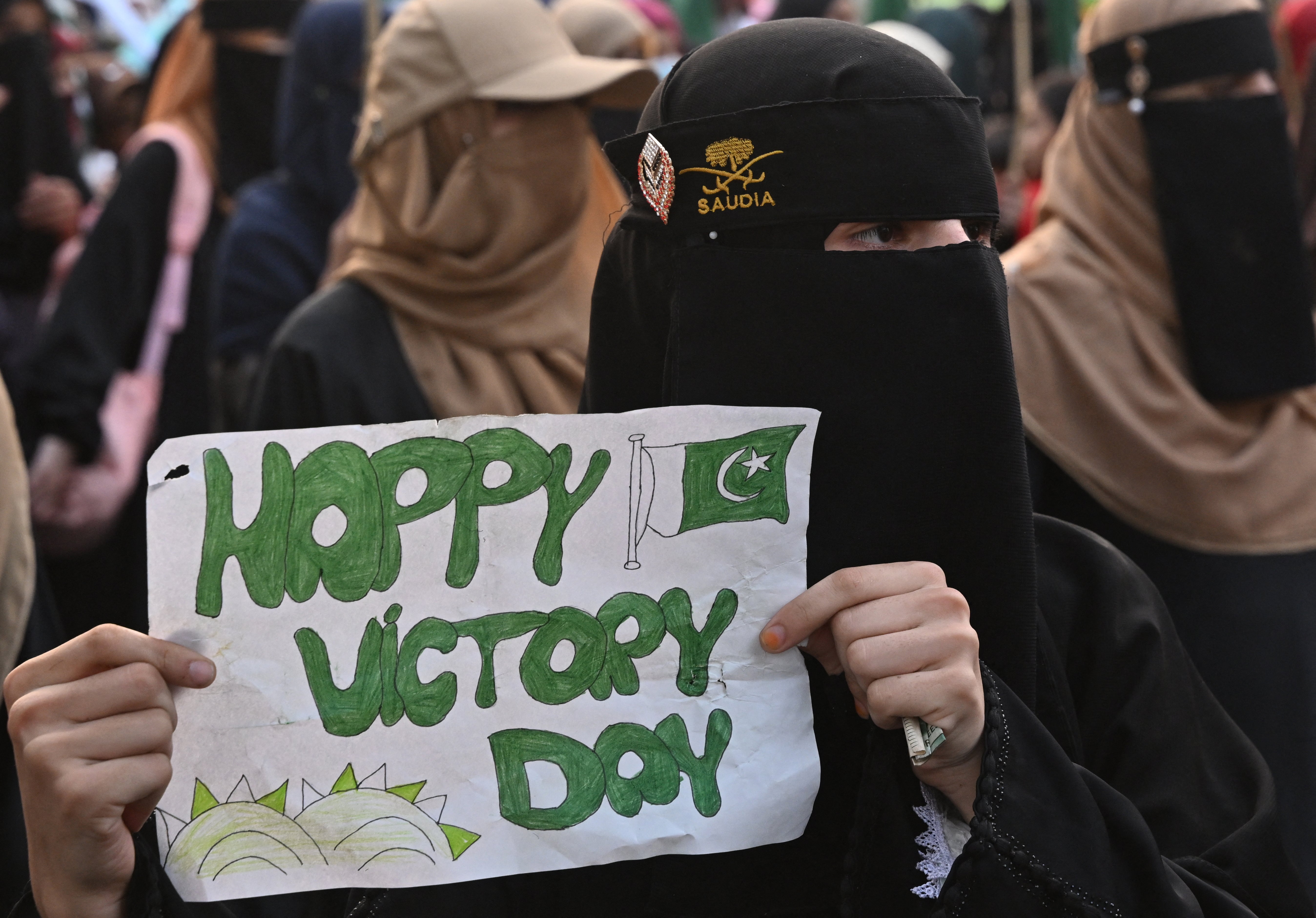 Pakistan's Muslim Women League activists march during a rally in Lahore on May 7, 2026 to mark one year of India-Pakistan conflict