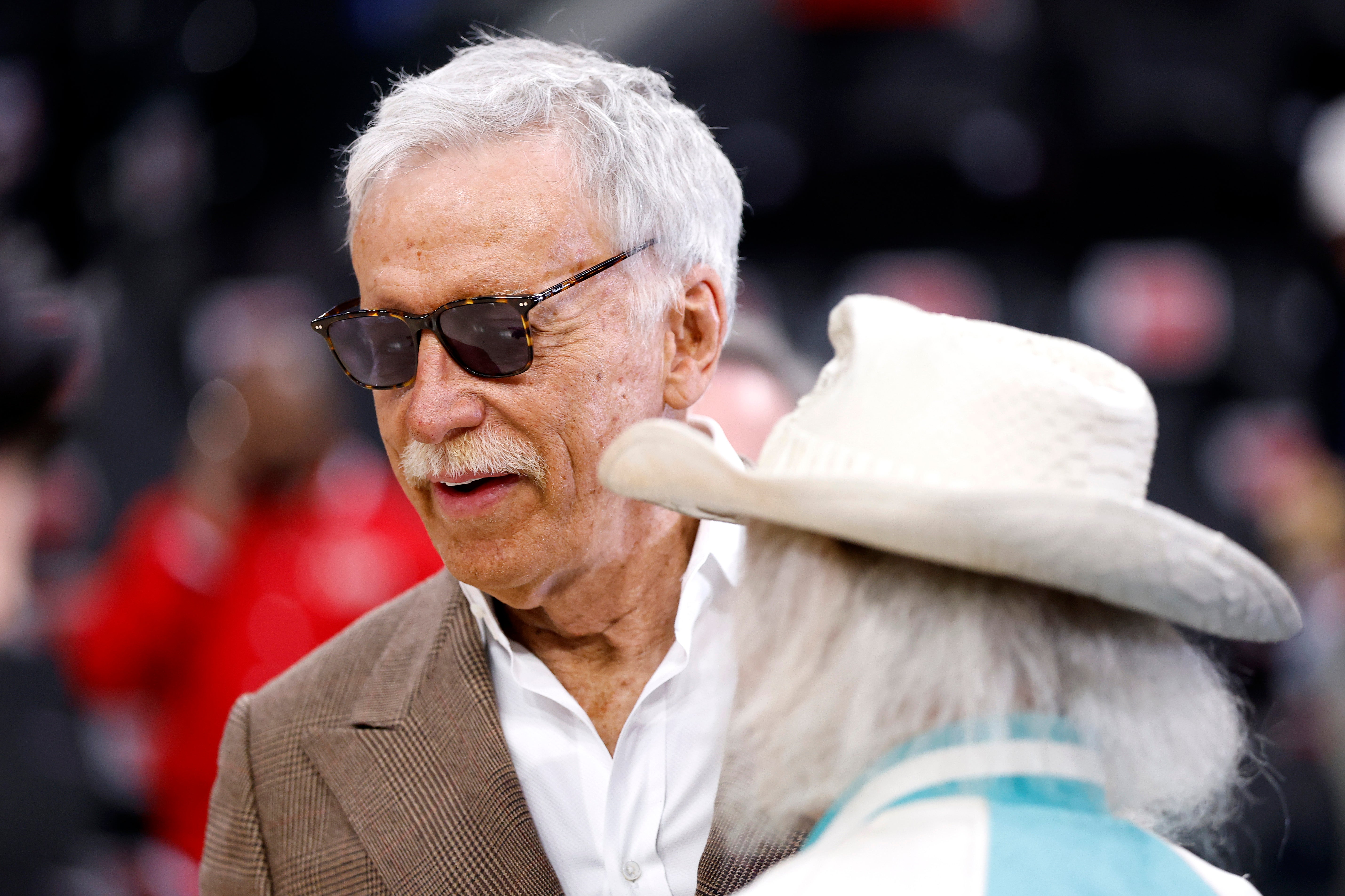 Kroenke speaks to a fan before his Denver Nuggets play the Los Angeles Clippers in Game 3 of the Western Conference First Round NBA Playoffs at the Intuit Dome in Inglewood, California, on April 24, 2025