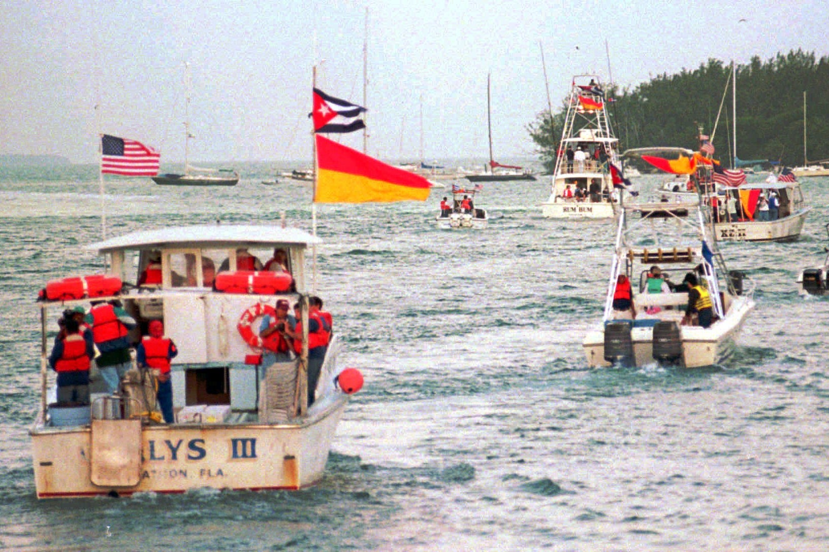 Some of the boats from the flotilla head for open waters March 2, 1996 off Key West, Fla., carrying Cuban Americans to the site of the downing of two Brothers to the Rescue planes by Cuban fighters