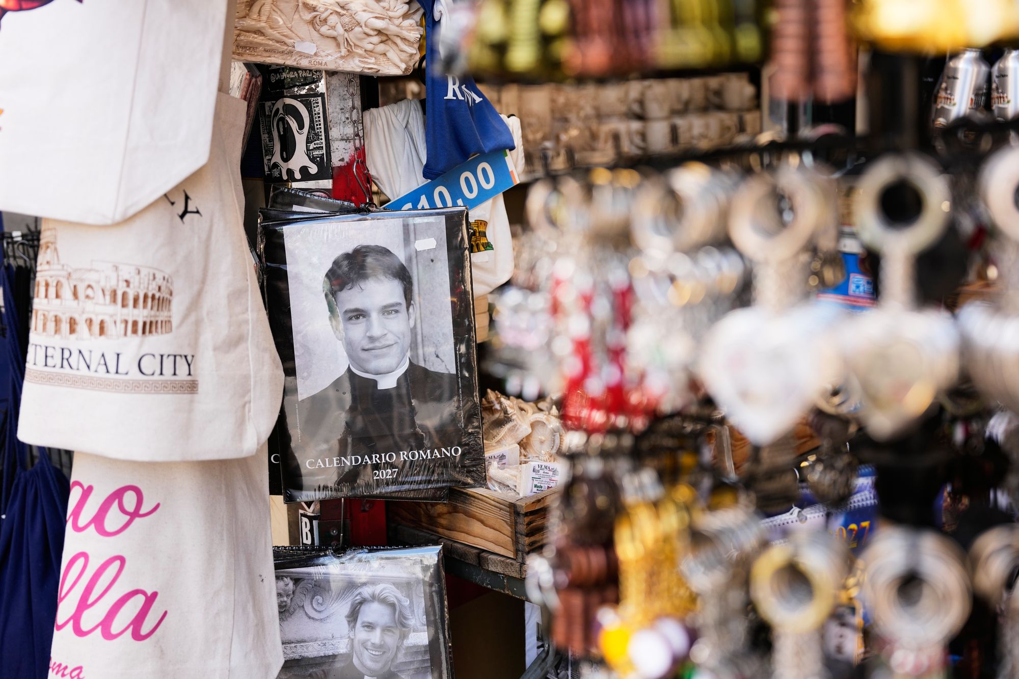 The calendar retails for around 8 euros in shops surrounding the Vatican and throughout Rome’s historic centre, with one shop clerk, Hassam Mohammad, reporting sales of a handful daily