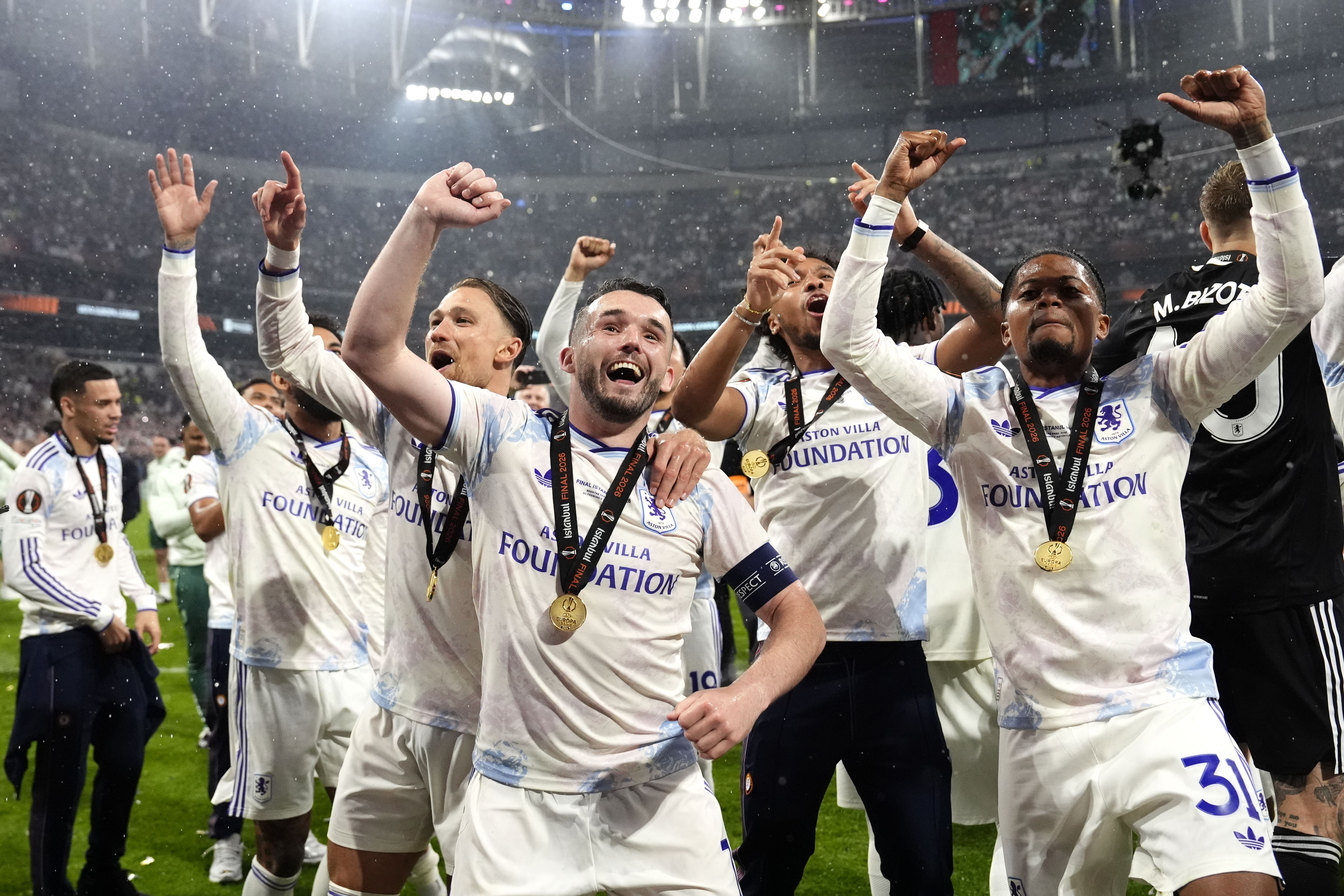 Aston Villa players celebrate winning the Europa League (Nick Potts/PA)