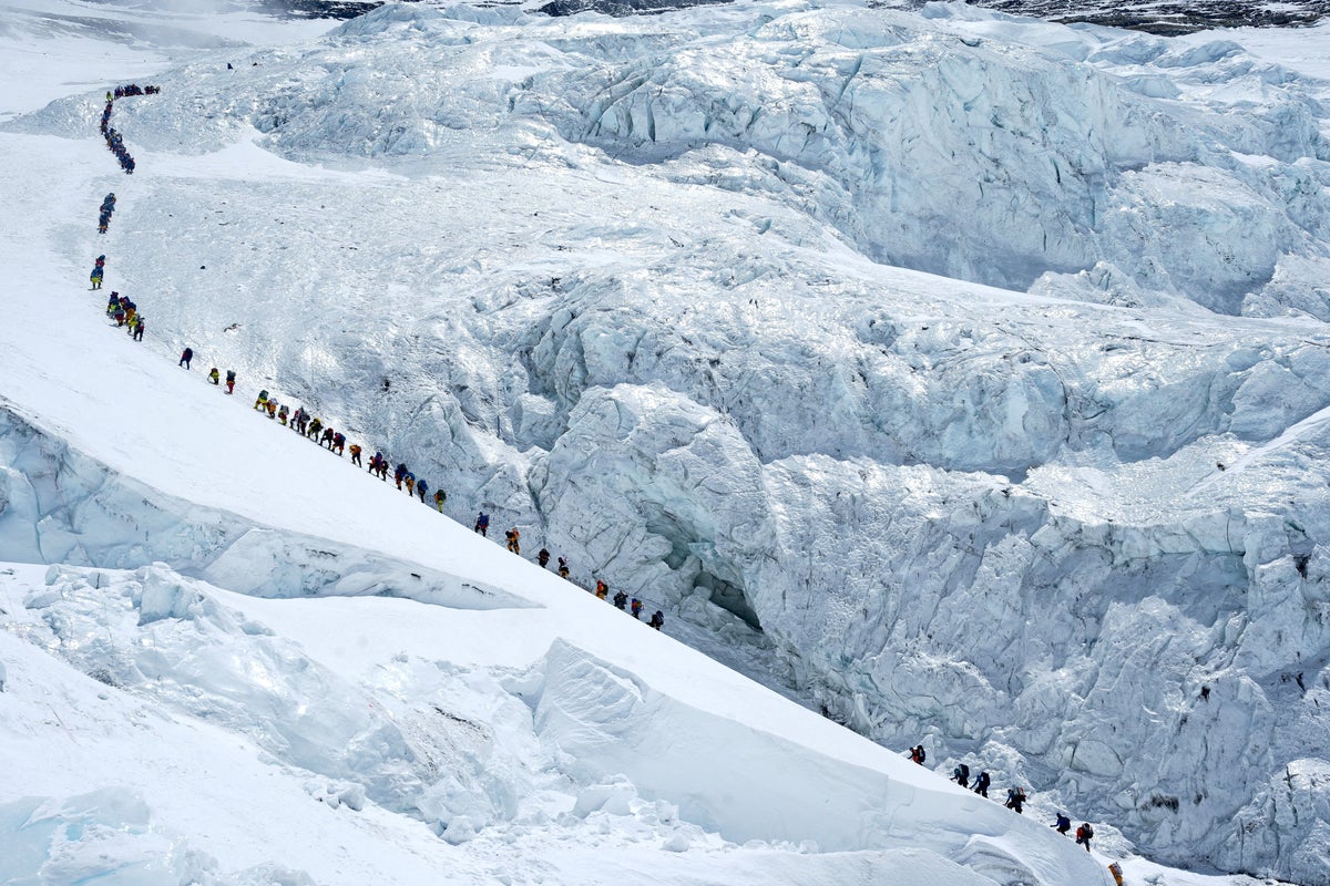 Hundreds of climbers make Mount Everest history as new summit record announced – UK Times