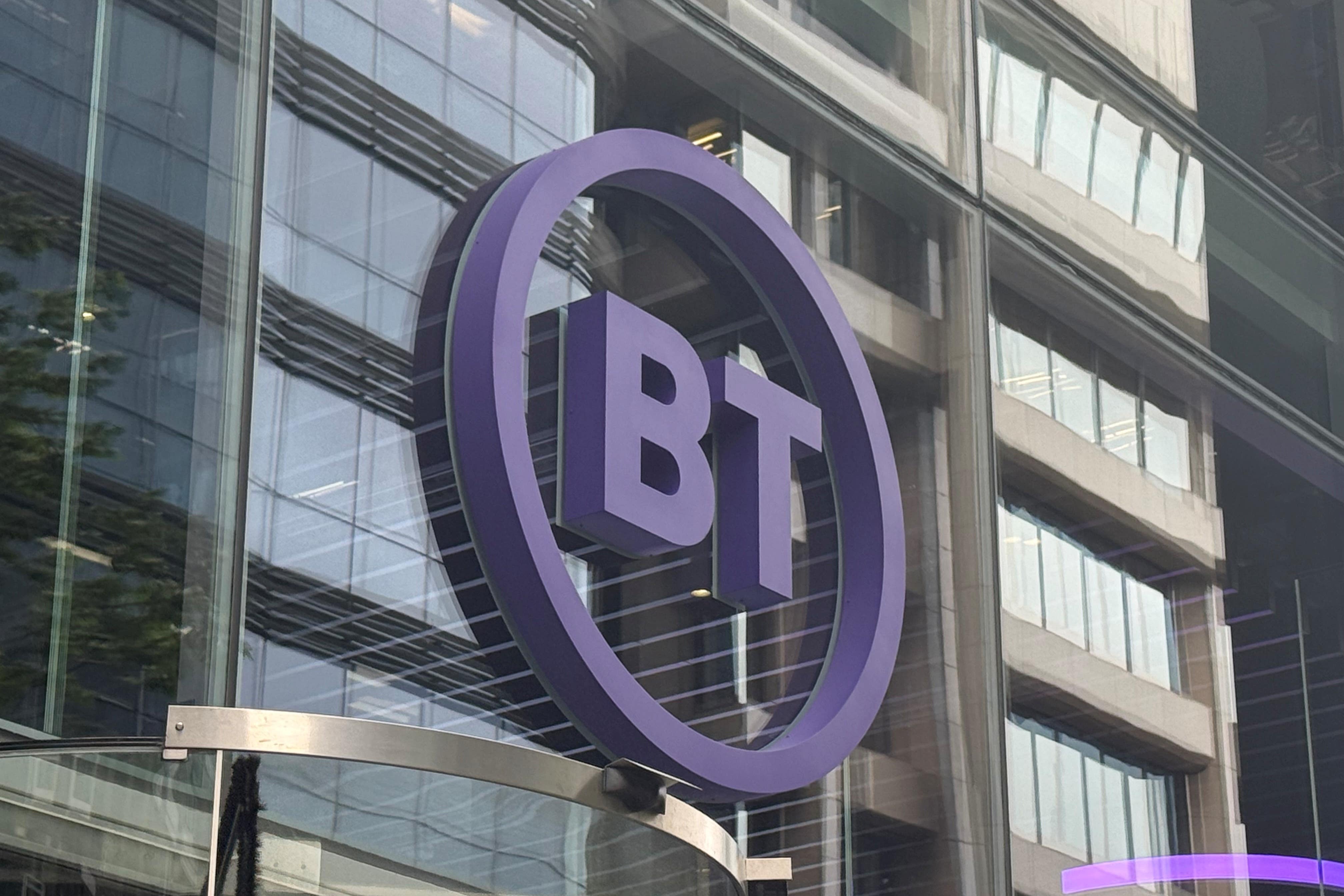 BT has revealed aims to cut costs by a further ยฃ700 million over the next four years as it reported flat full-year earnings and falling revenues