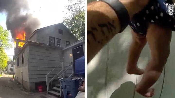 Moment trapped mother throws baby to safety from burning building