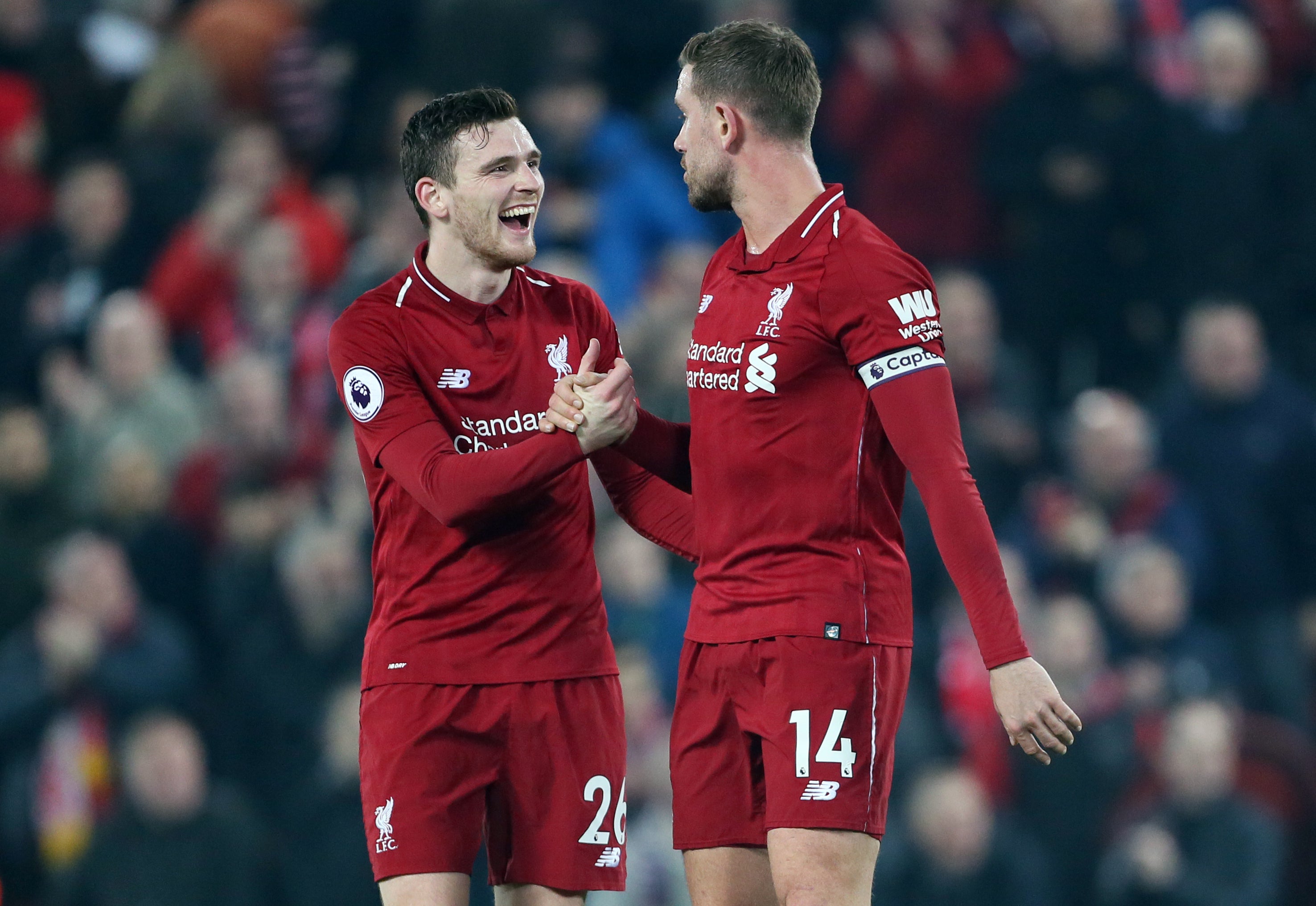 Robertson, left, hopes former teammate Jordan Henderson gets a good reception at Anfield
