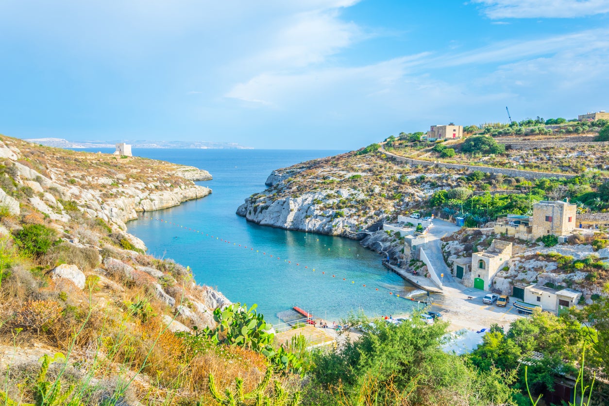 Mgarr ix-Xini bay on Gozo, Malta with the watchtower on the left hand cliff