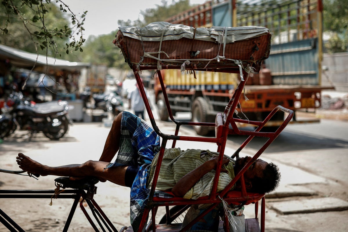 Heatwave grips India as record temperatures disrupt schools and close shops