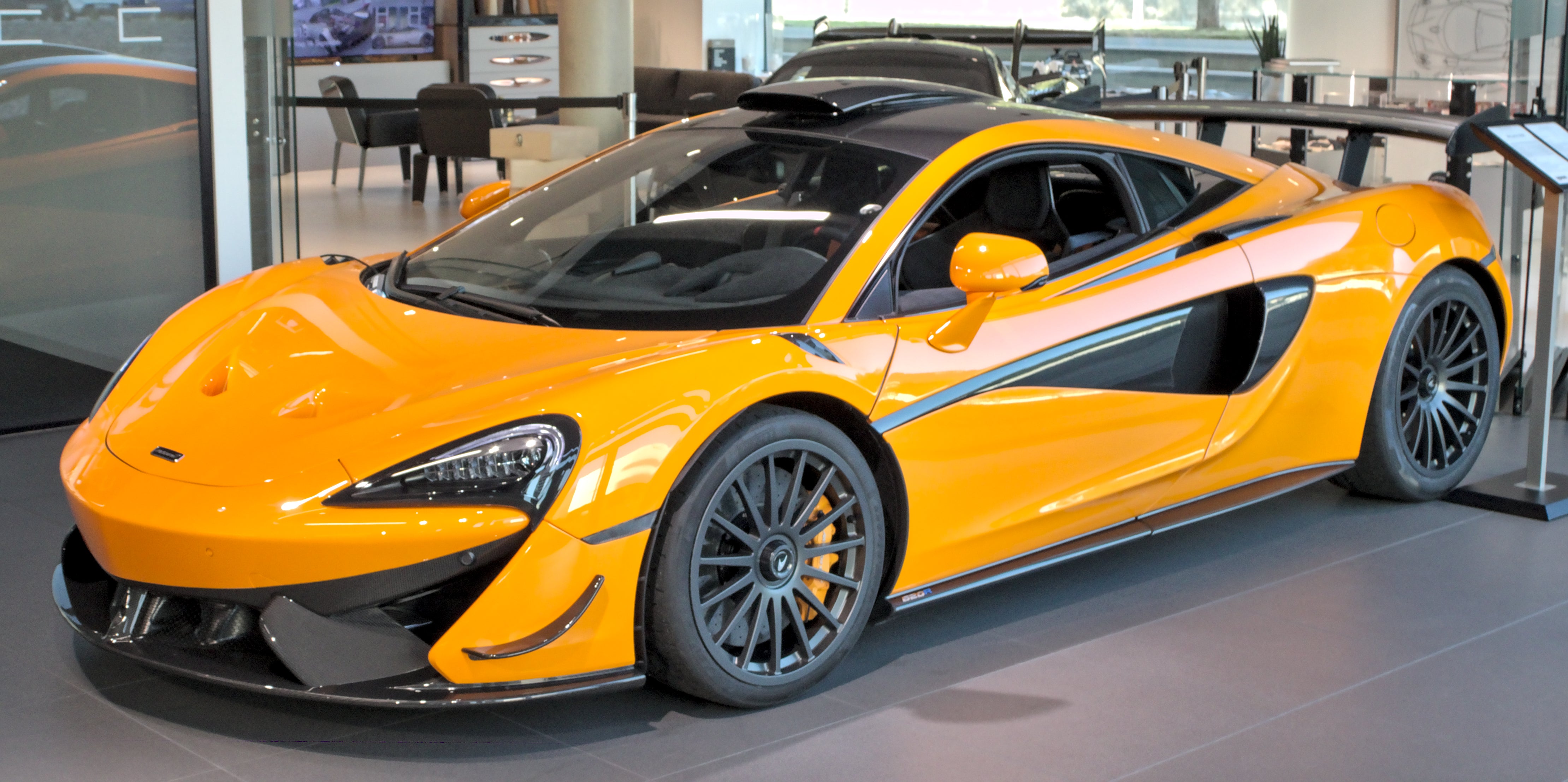 Purported fraudster Brandon Aaron Kreutz used the money he allegedly took in from victims to fund a pricey lifestyle, including a McLaren supercar, like the one seen here, he used in self-funded racing competitions