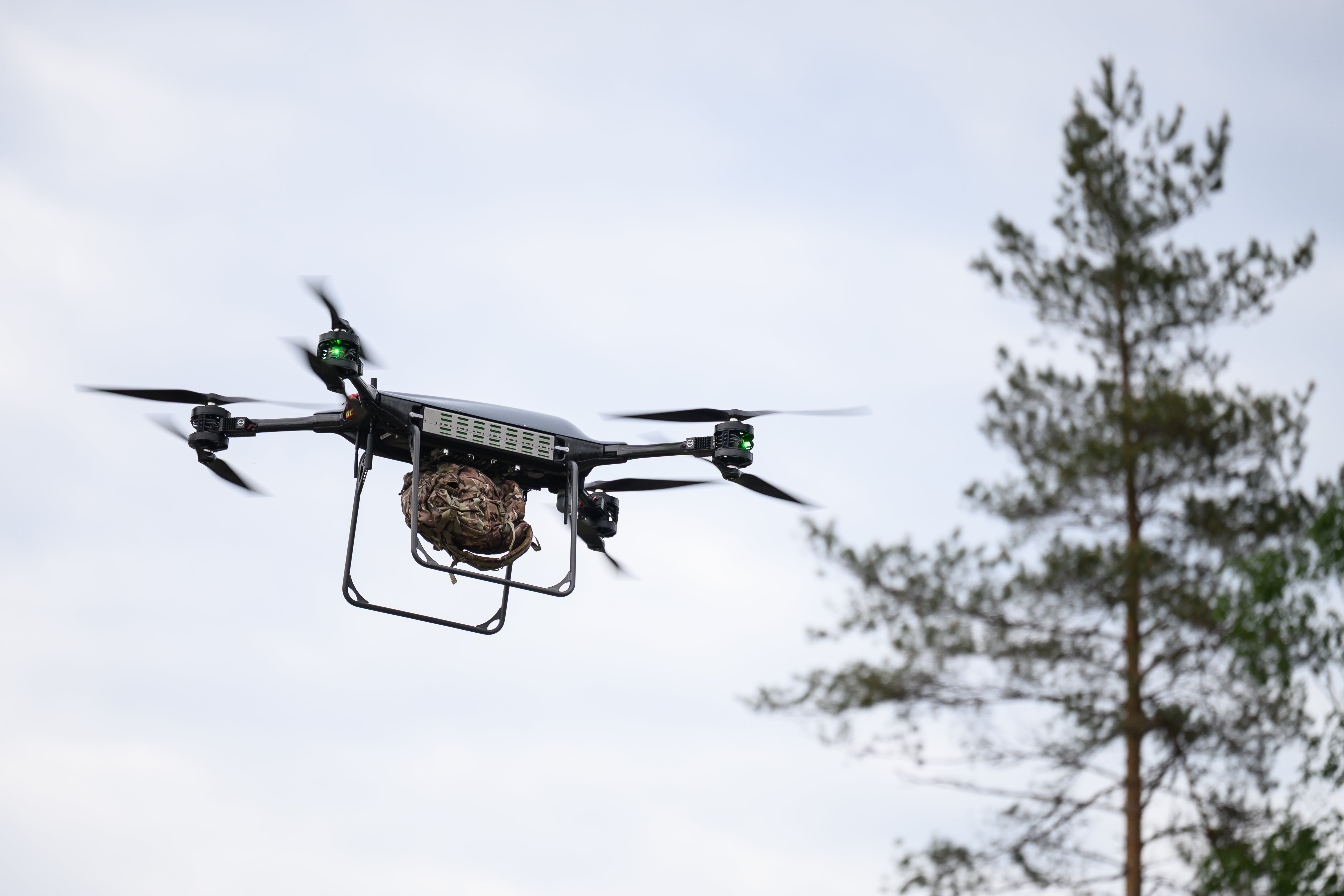 A quadcopter logistics system carries a load as personnel from 2 SCOTS of the 4th Light Brigade participate in exercise Spring Storm near Voru, Southern Estonia (Getty)
